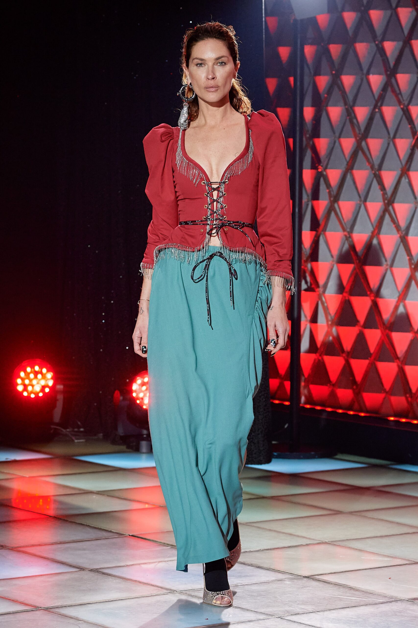 red fitted top with teal skirt