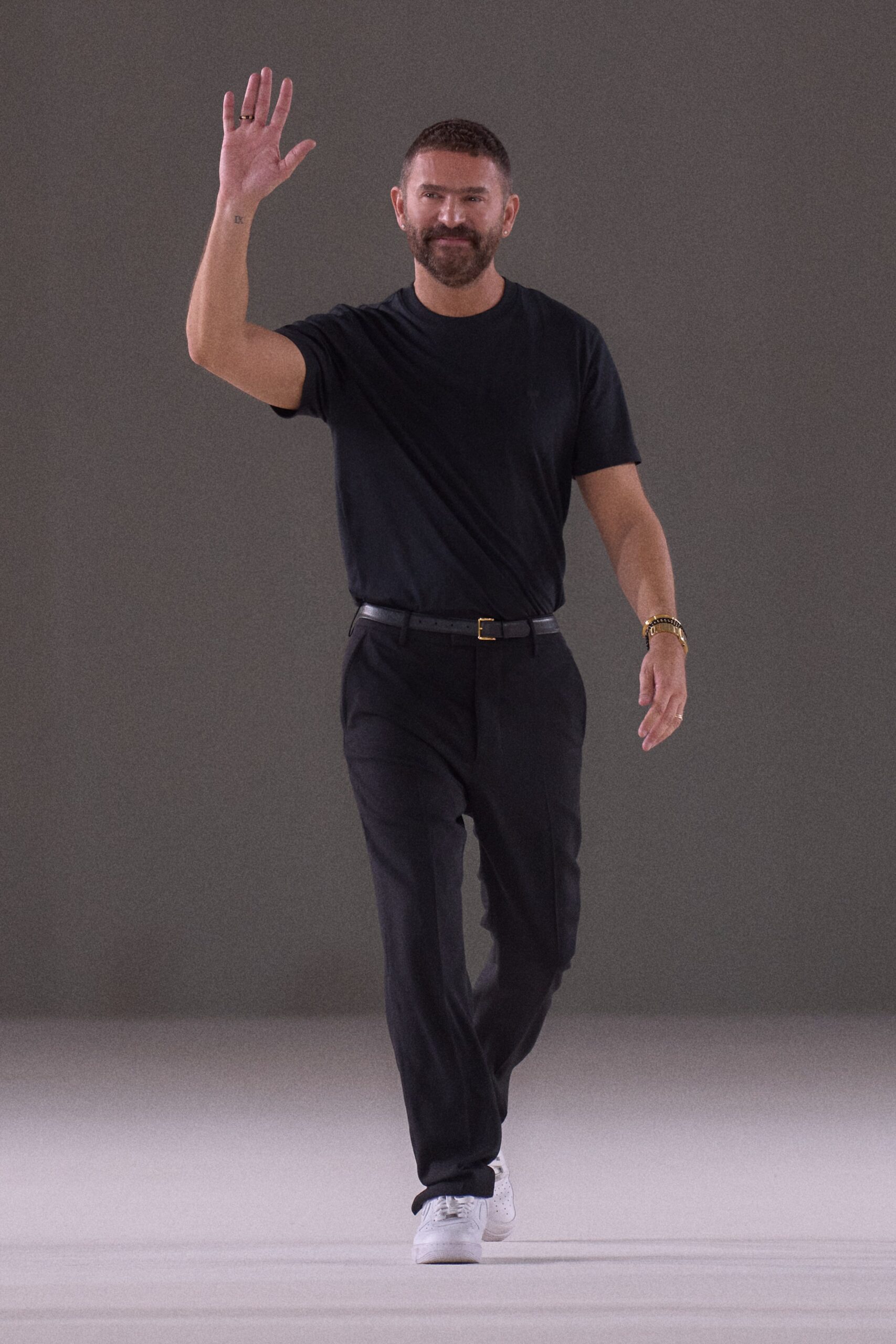 black t-shirt and tailored pants