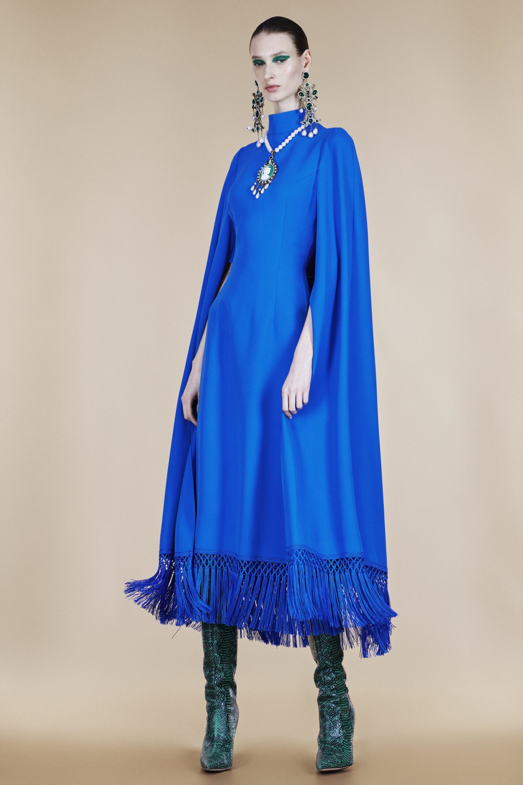 blue silk dress with cape