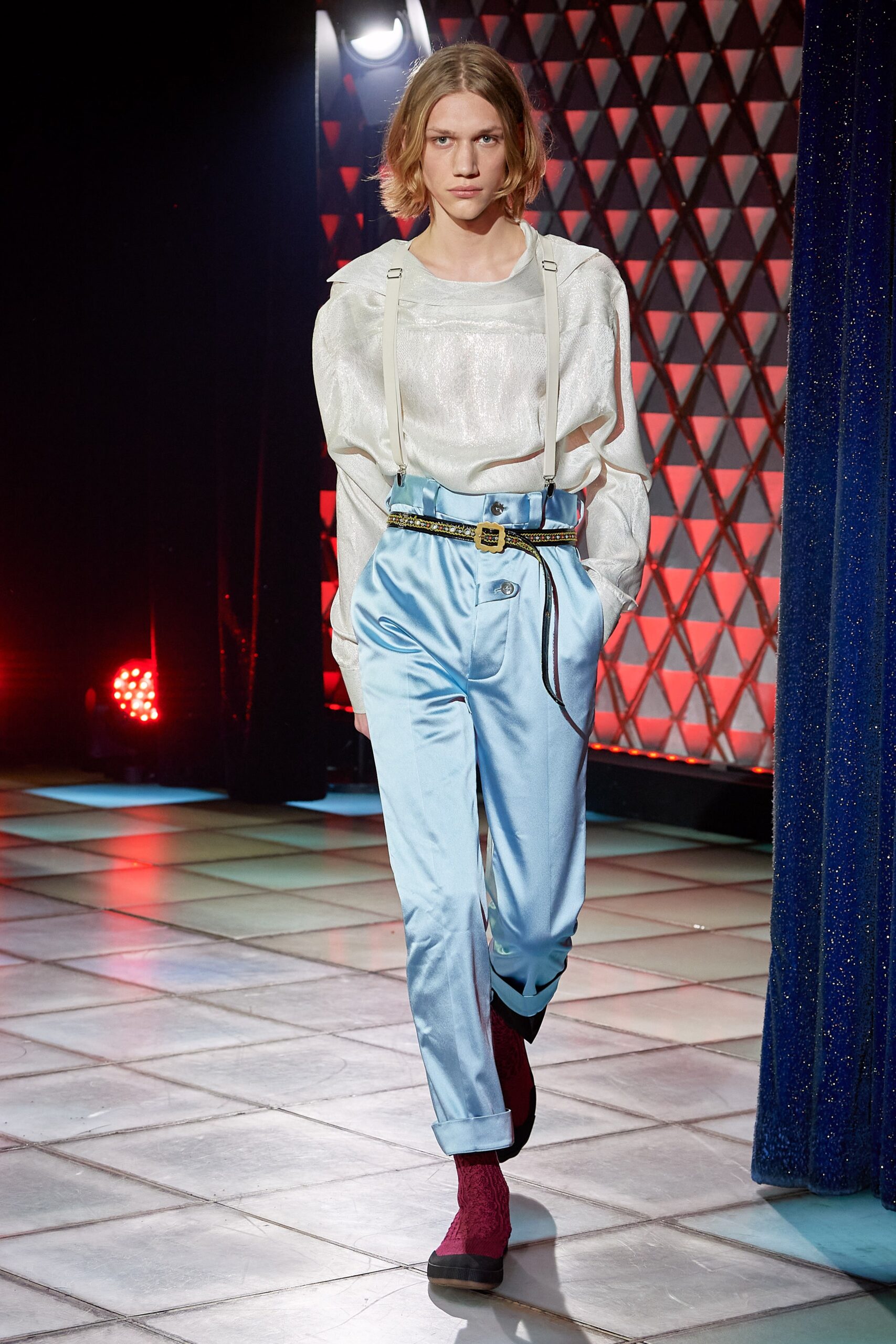 white silk relaxed shirt with blue tailored pants