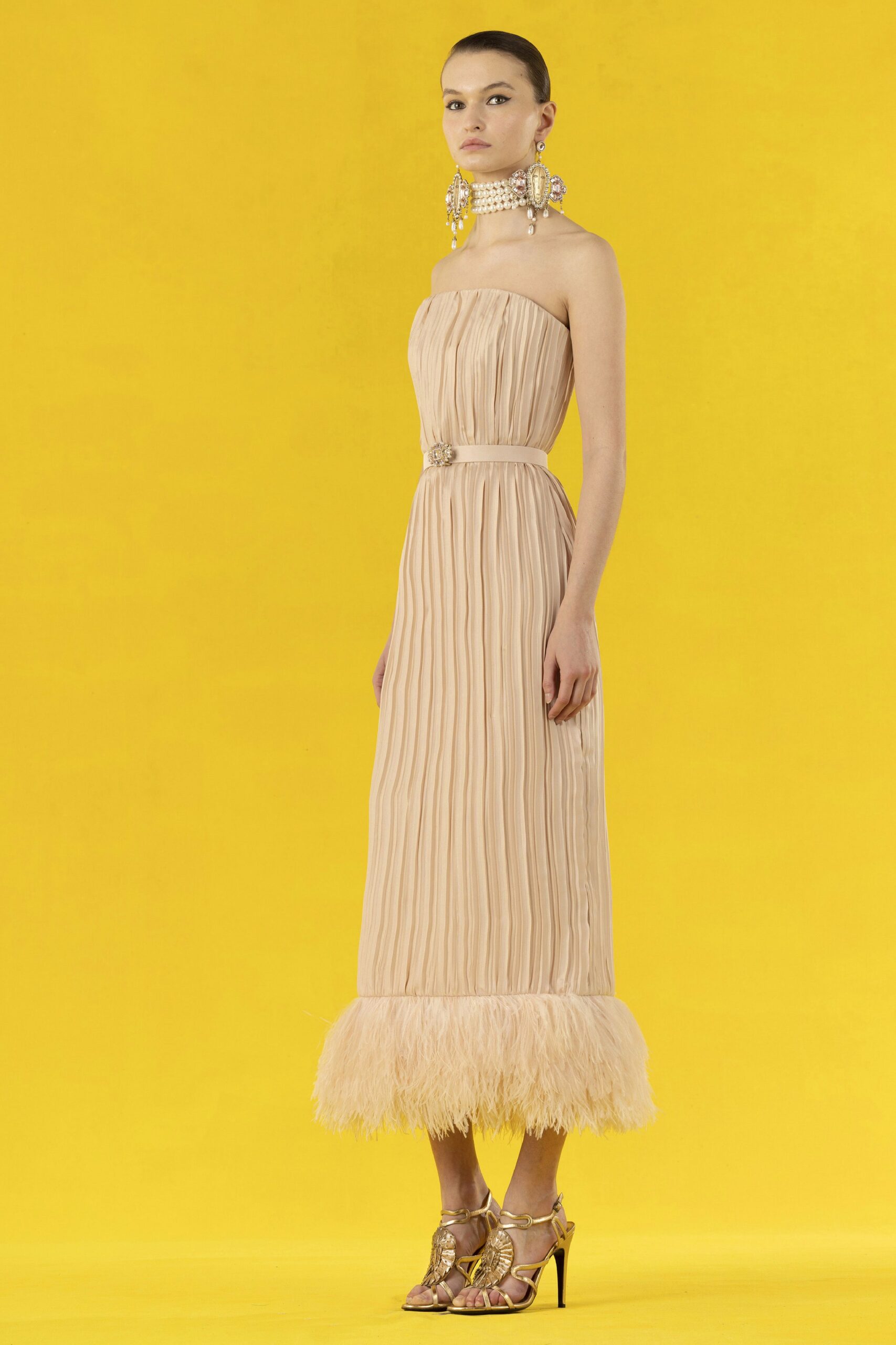 beige pleated strapless gown