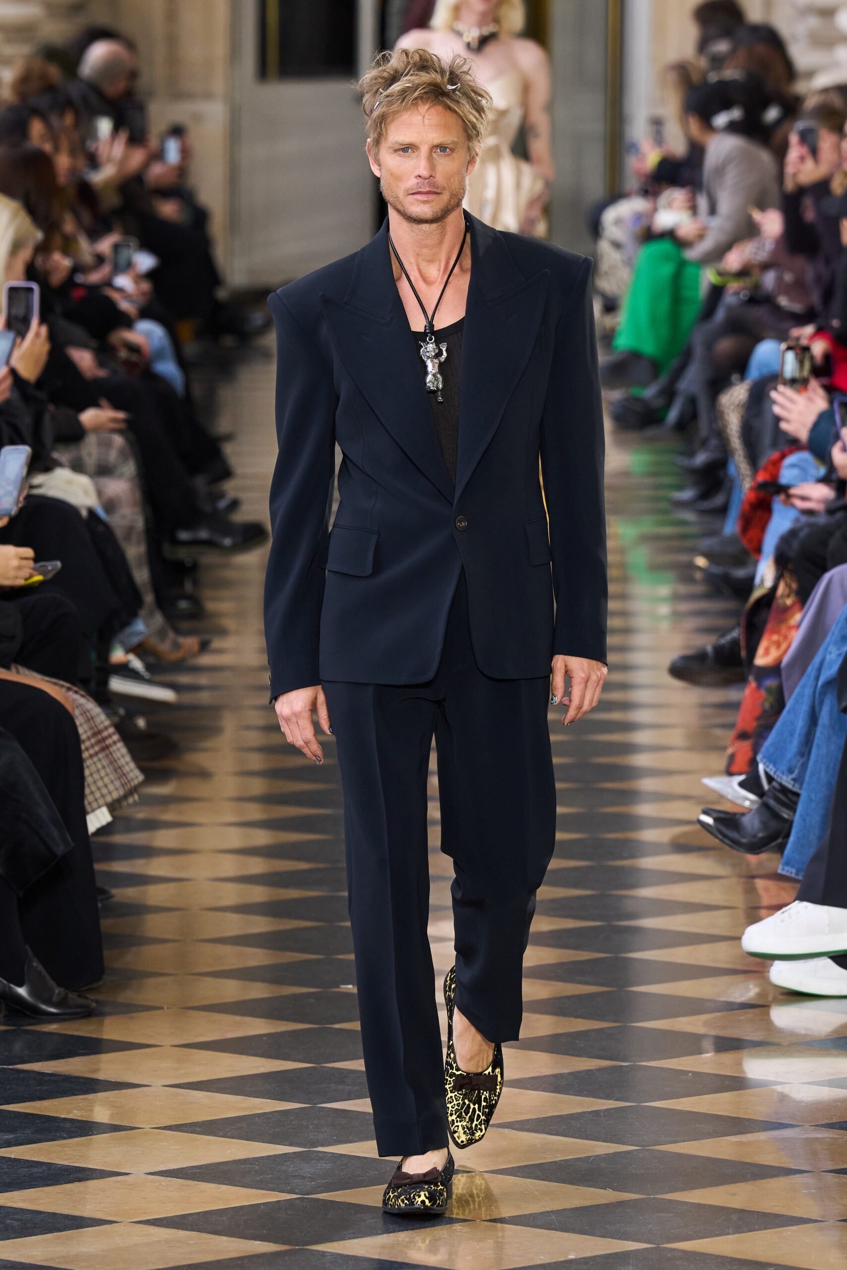 blue tailored suit with embellished shoes