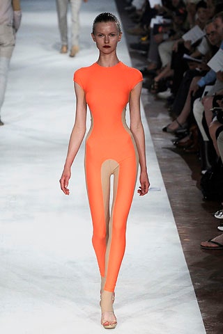 fitted orange neoprene catsuit