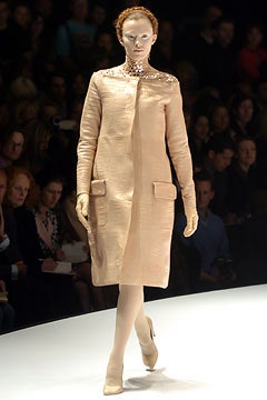 beige silk long-sleeve collared fitted buttoned pockets coat