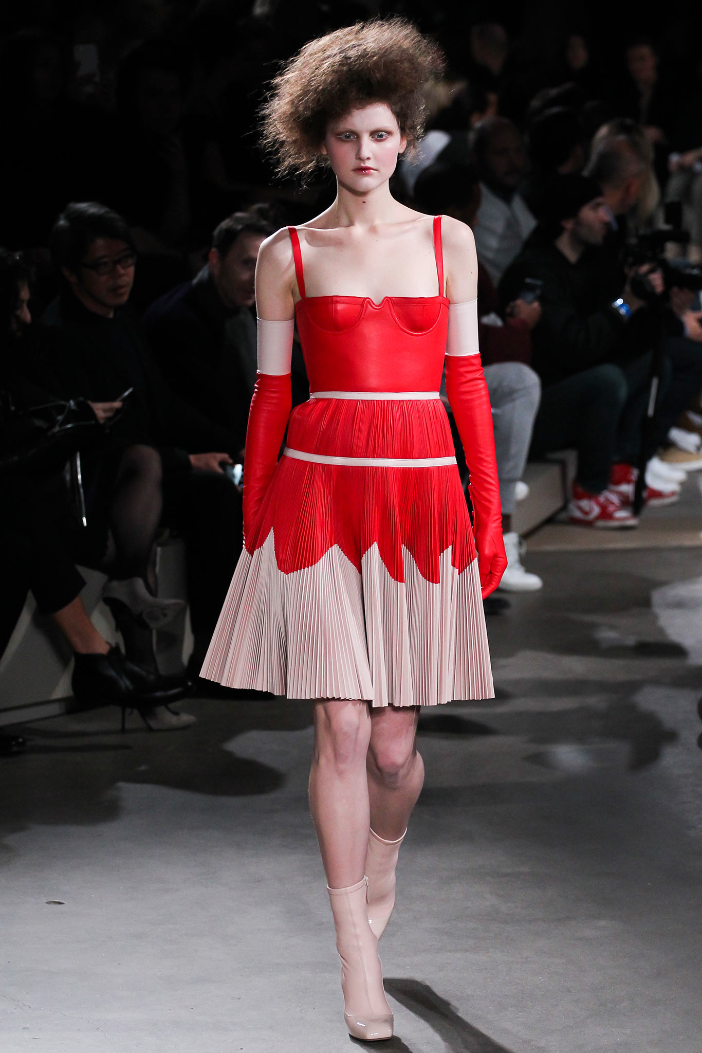 red silk sleeveless high-neck fitted pleated flared dress
