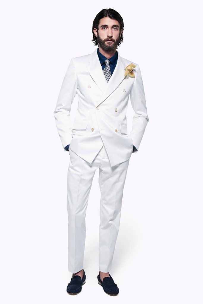 white tailored suit with blue shirt