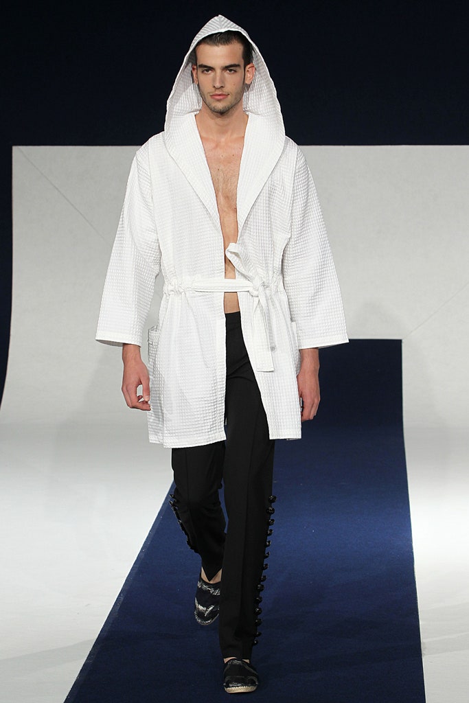 white hooded coat and black pants