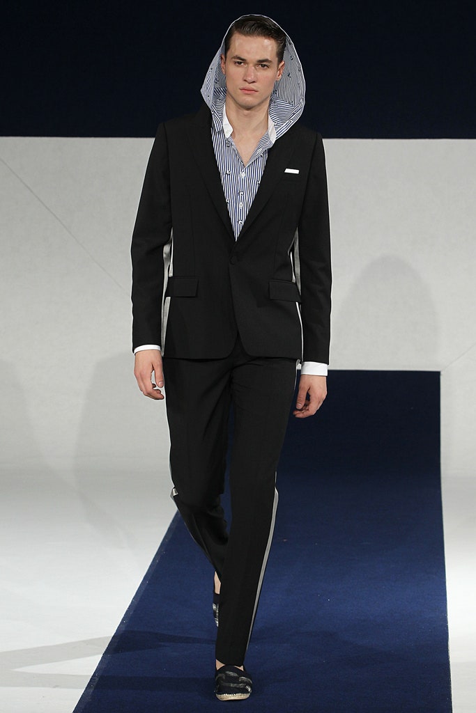 black tailored suit with striped shirt