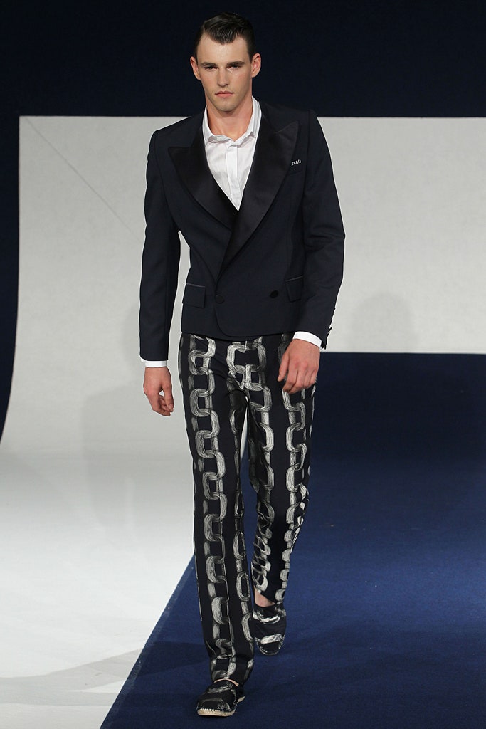 black tailored blazer with printed pants