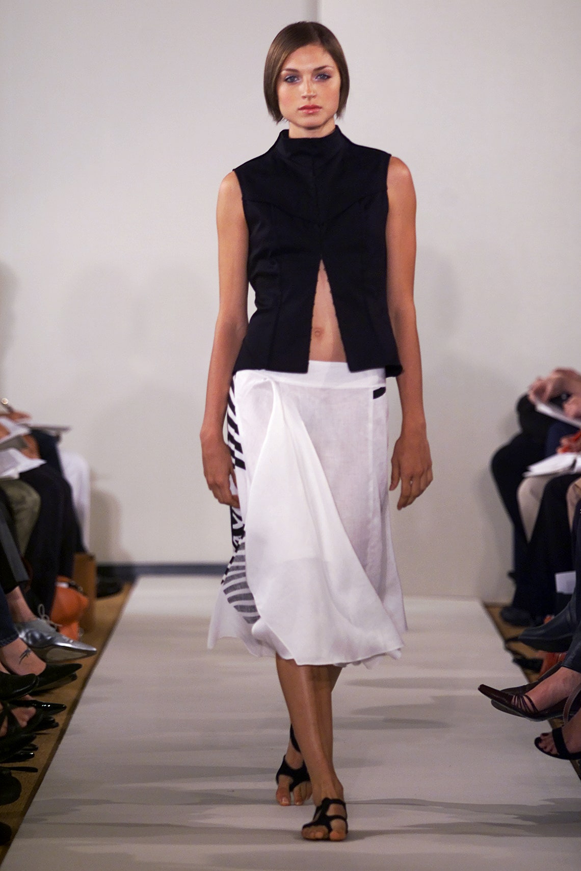 black fitted top with white skirt