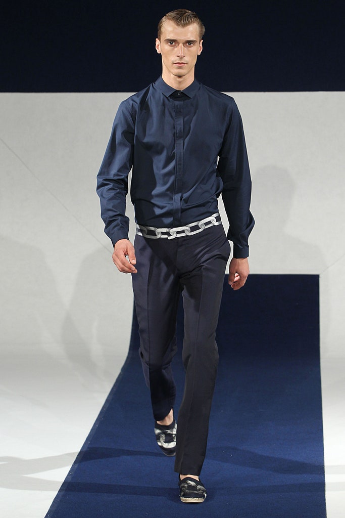 blue fitted shirt with black pants