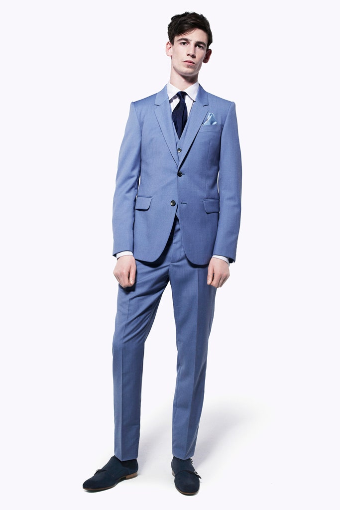 blue tailored suit with white shirt