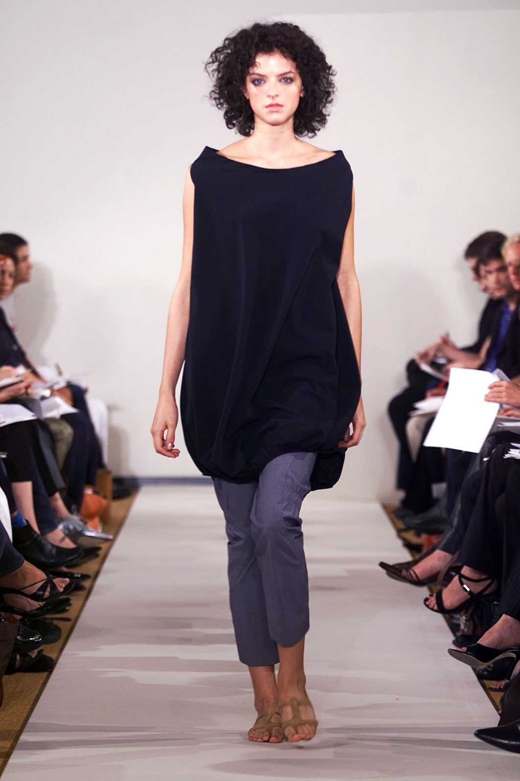 black relaxed dress with gray pants