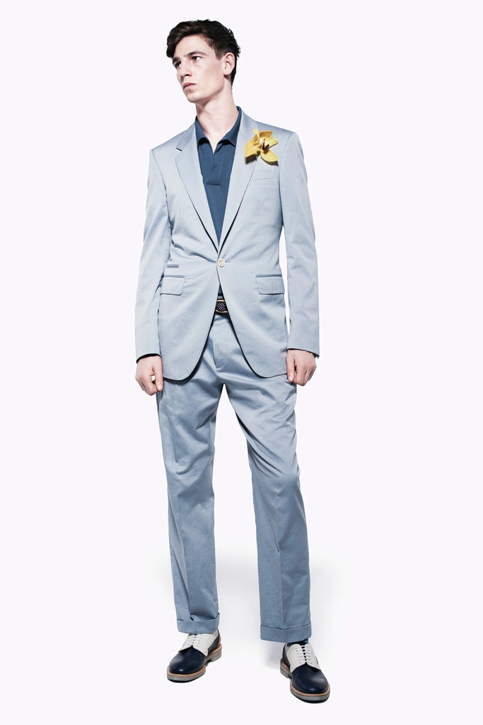 light blue tailored suit with navy shirt