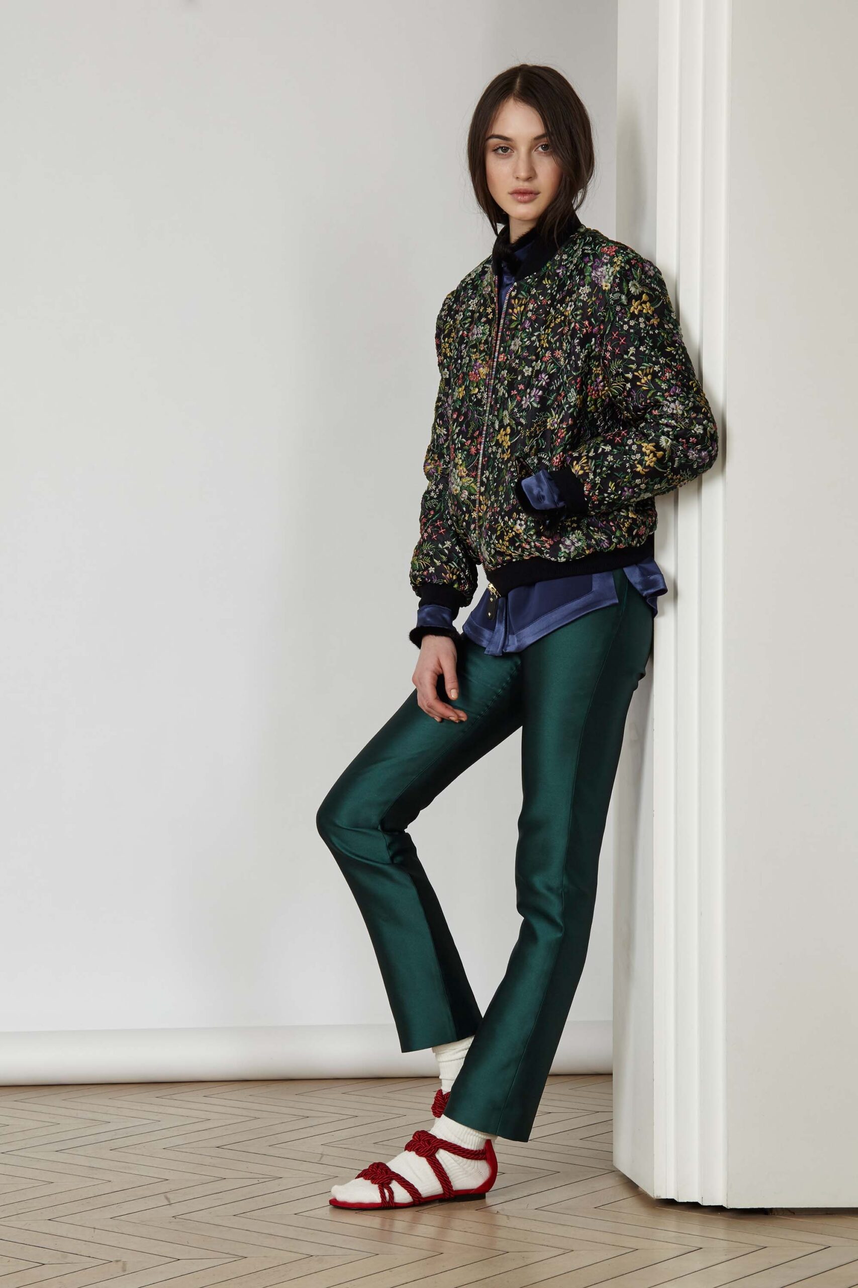 embroidered black jacket with blue shirt