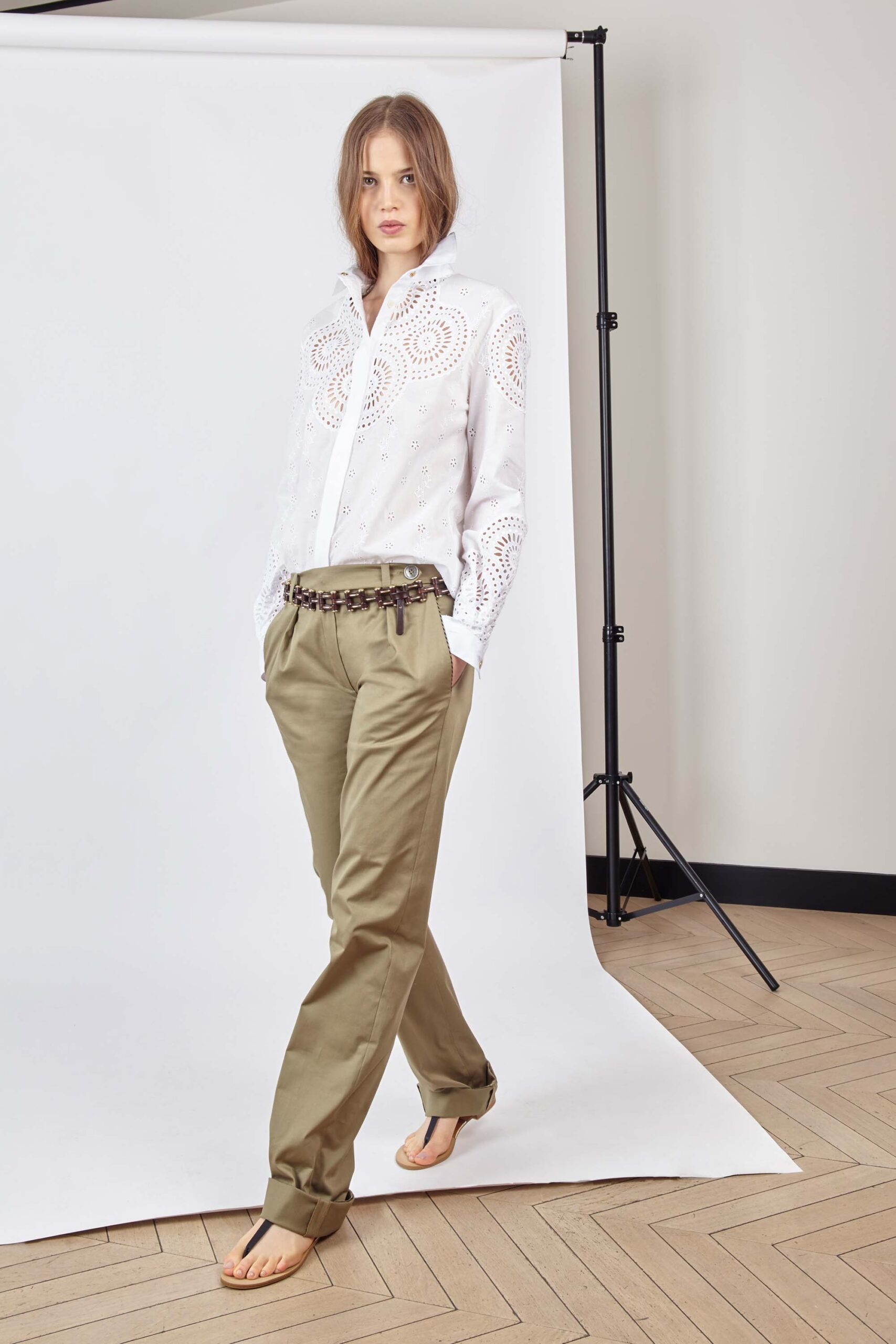 white embroidered shirt with beige pants