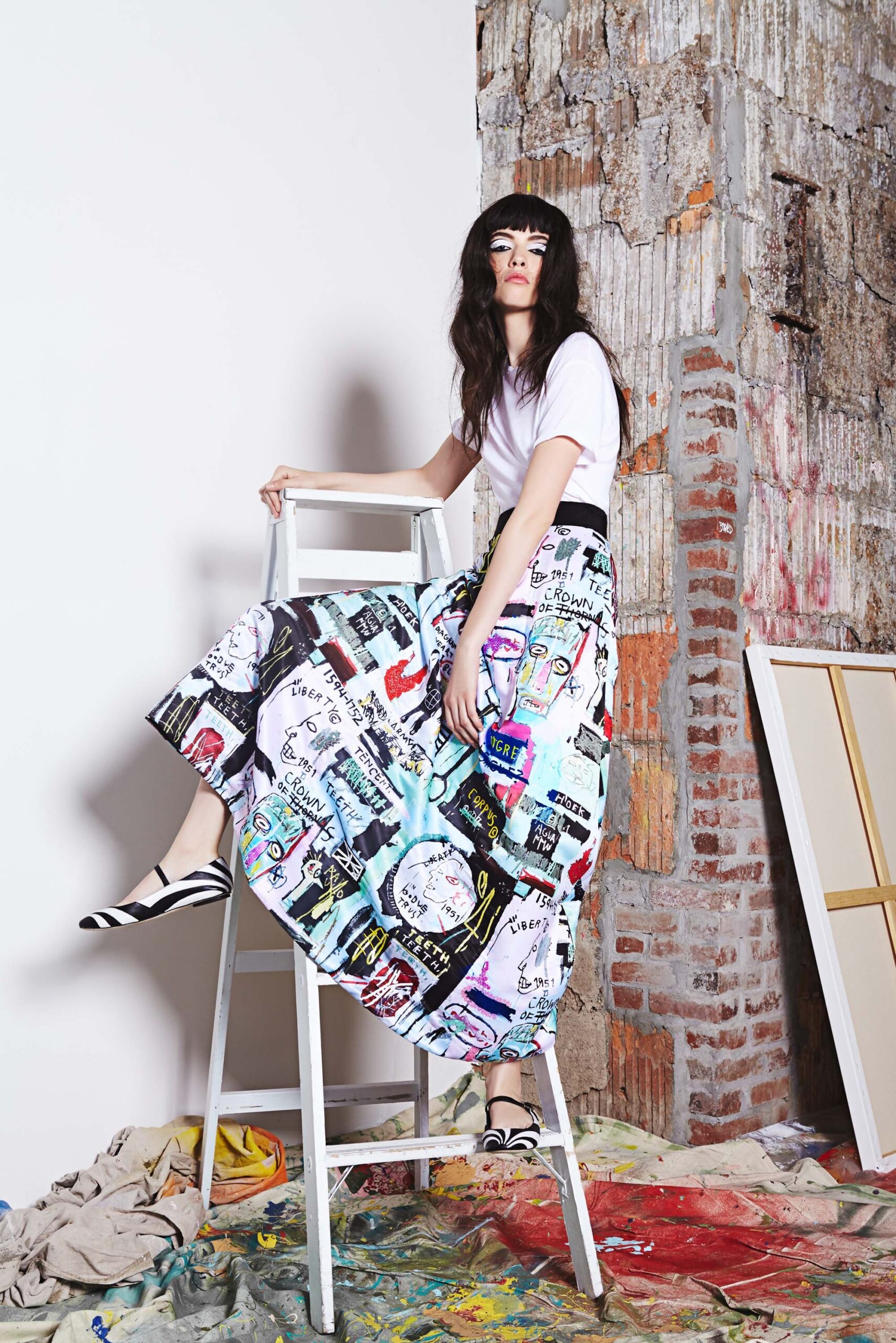 white relaxed top with multi-tiered skirt