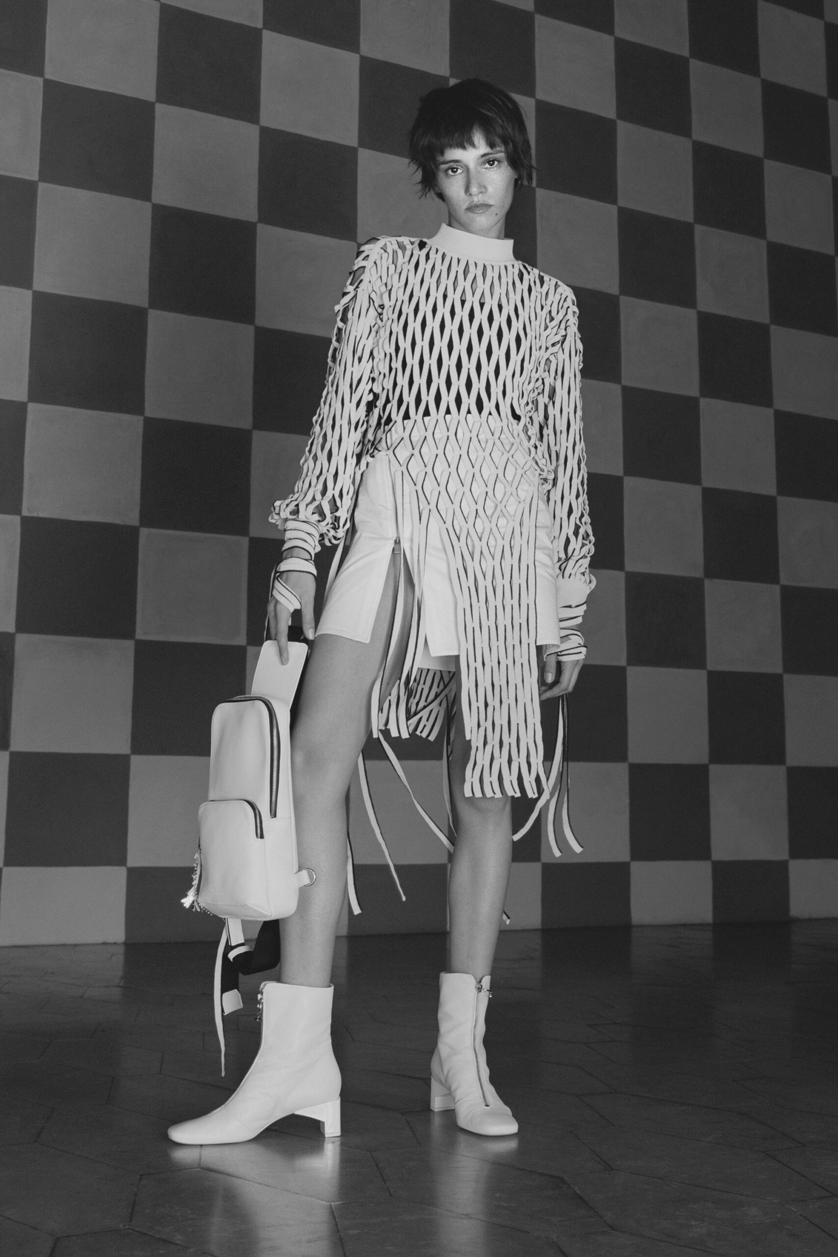 white fitted top and asymmetric skirt