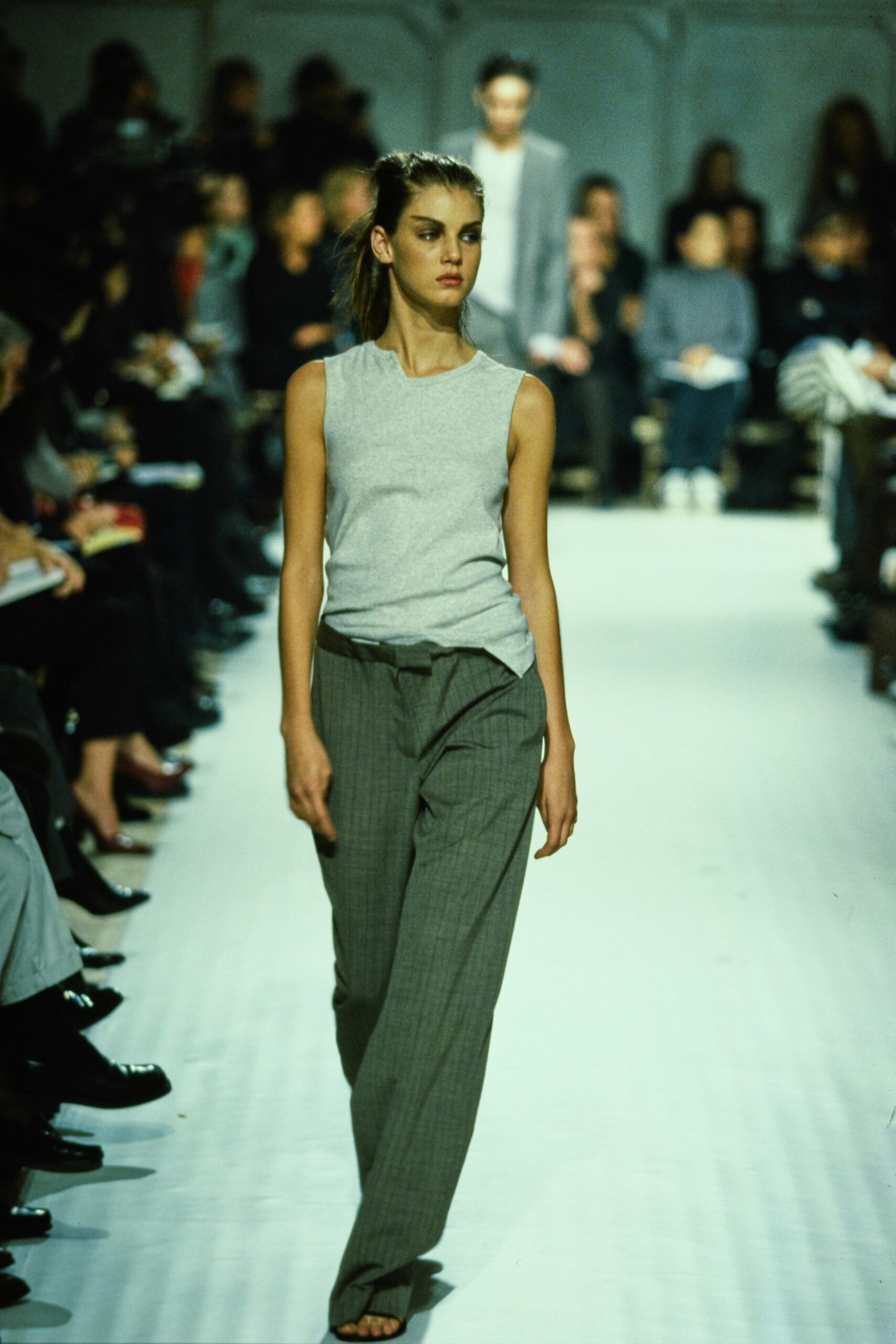 gray sleeveless top and relaxed pants