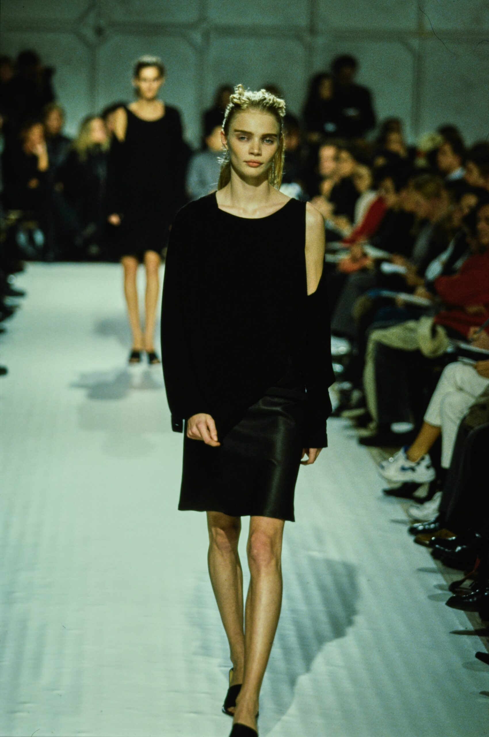 black relaxed top and fitted skirt