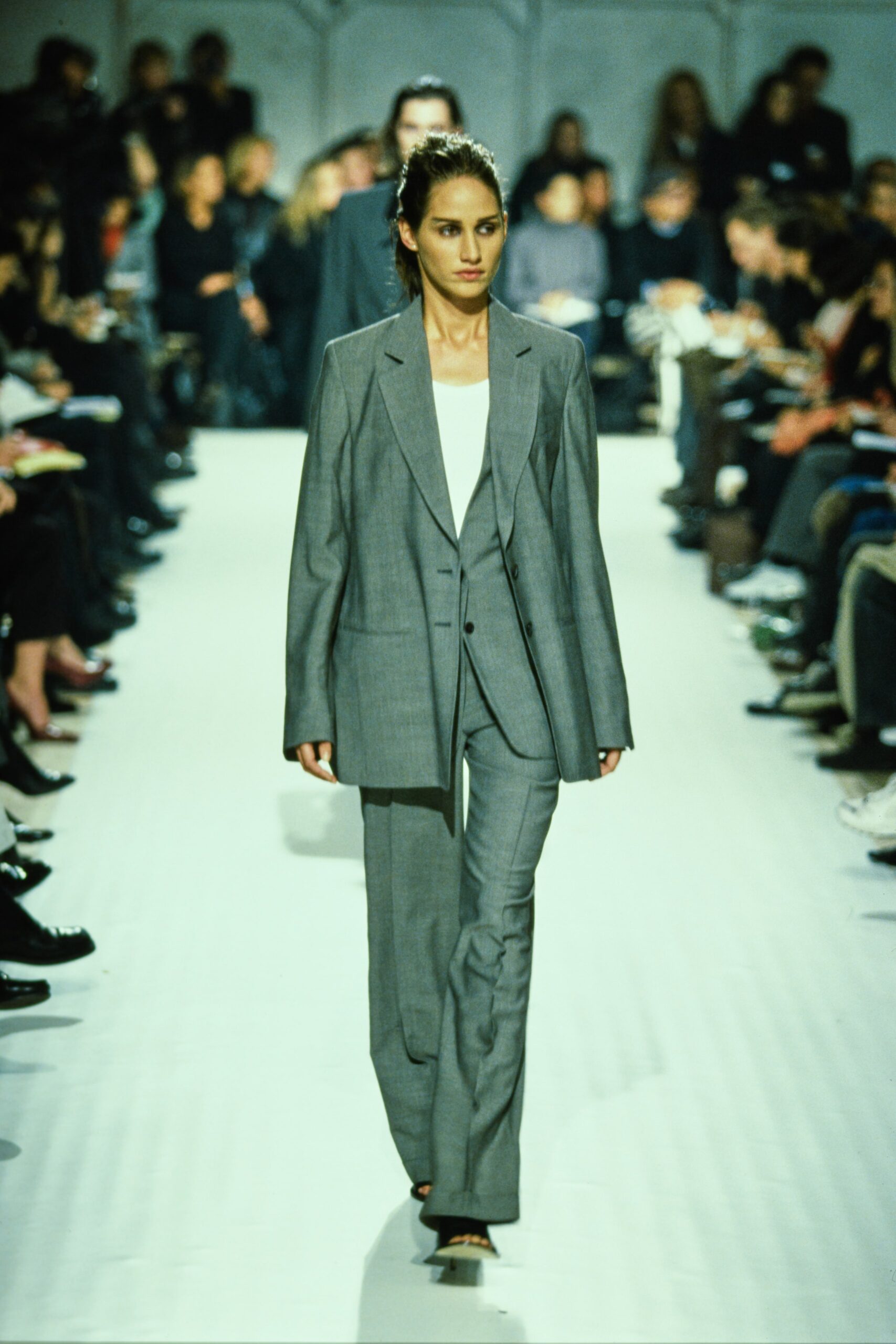 gray tailored suit with white top