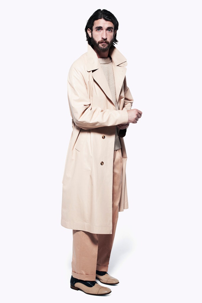 beige trench coat with sweater and tailored pants