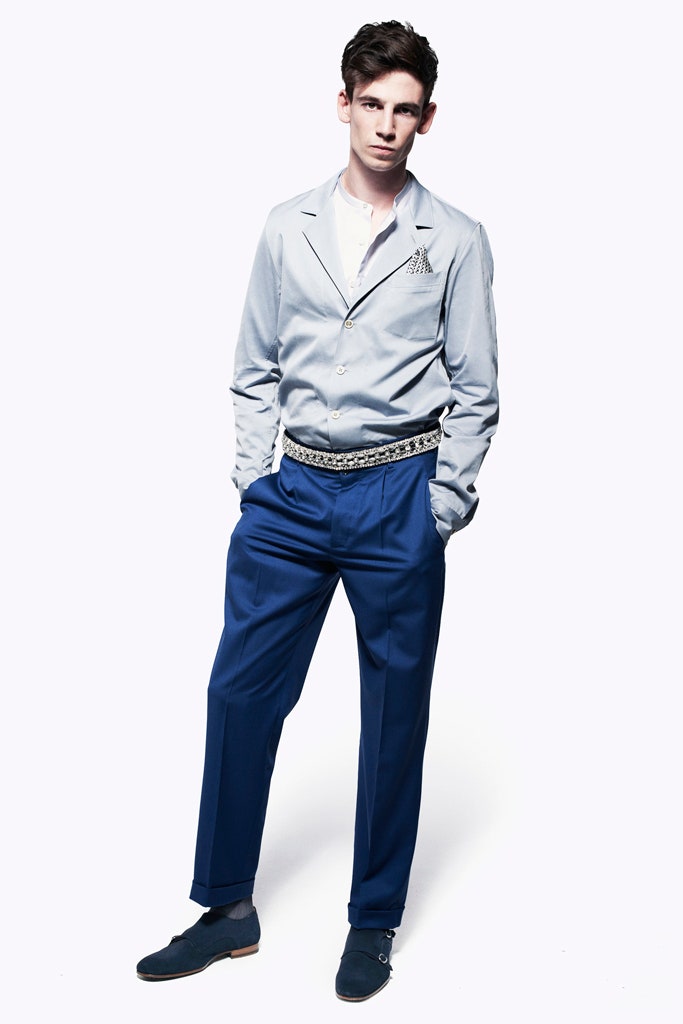 blue fitted shirt and tailored pants