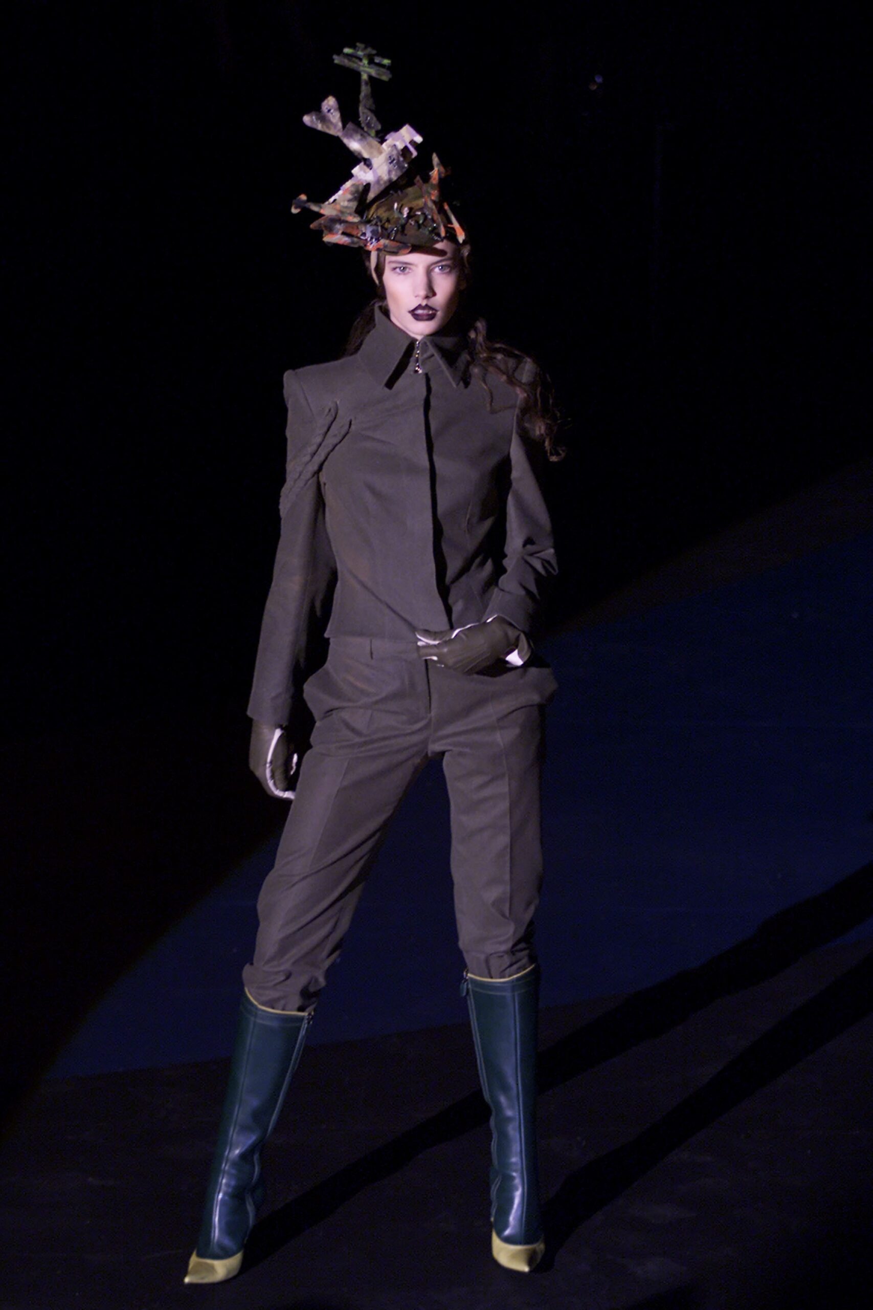 fitted green suit with boots