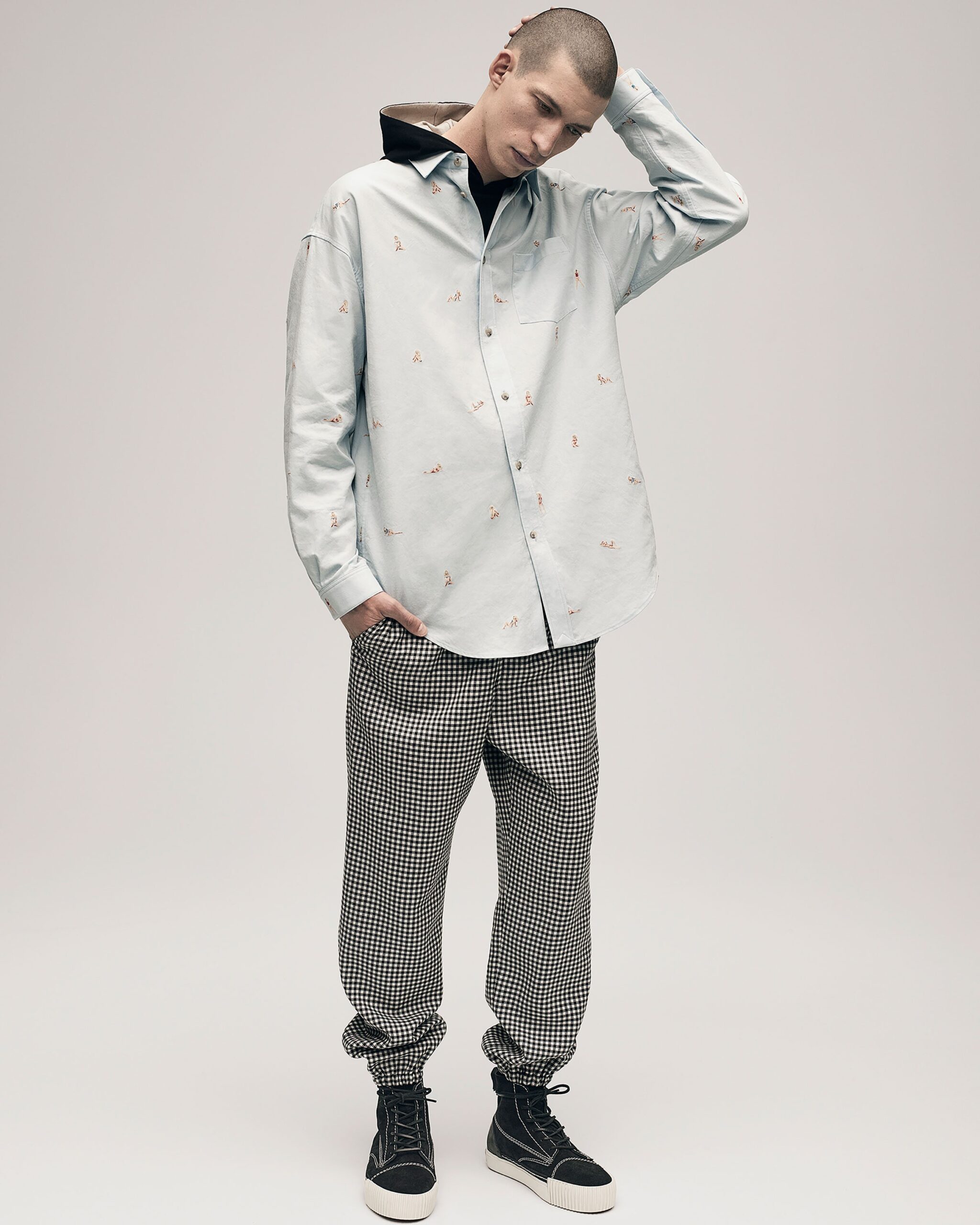 light blue printed shirt and checked pants