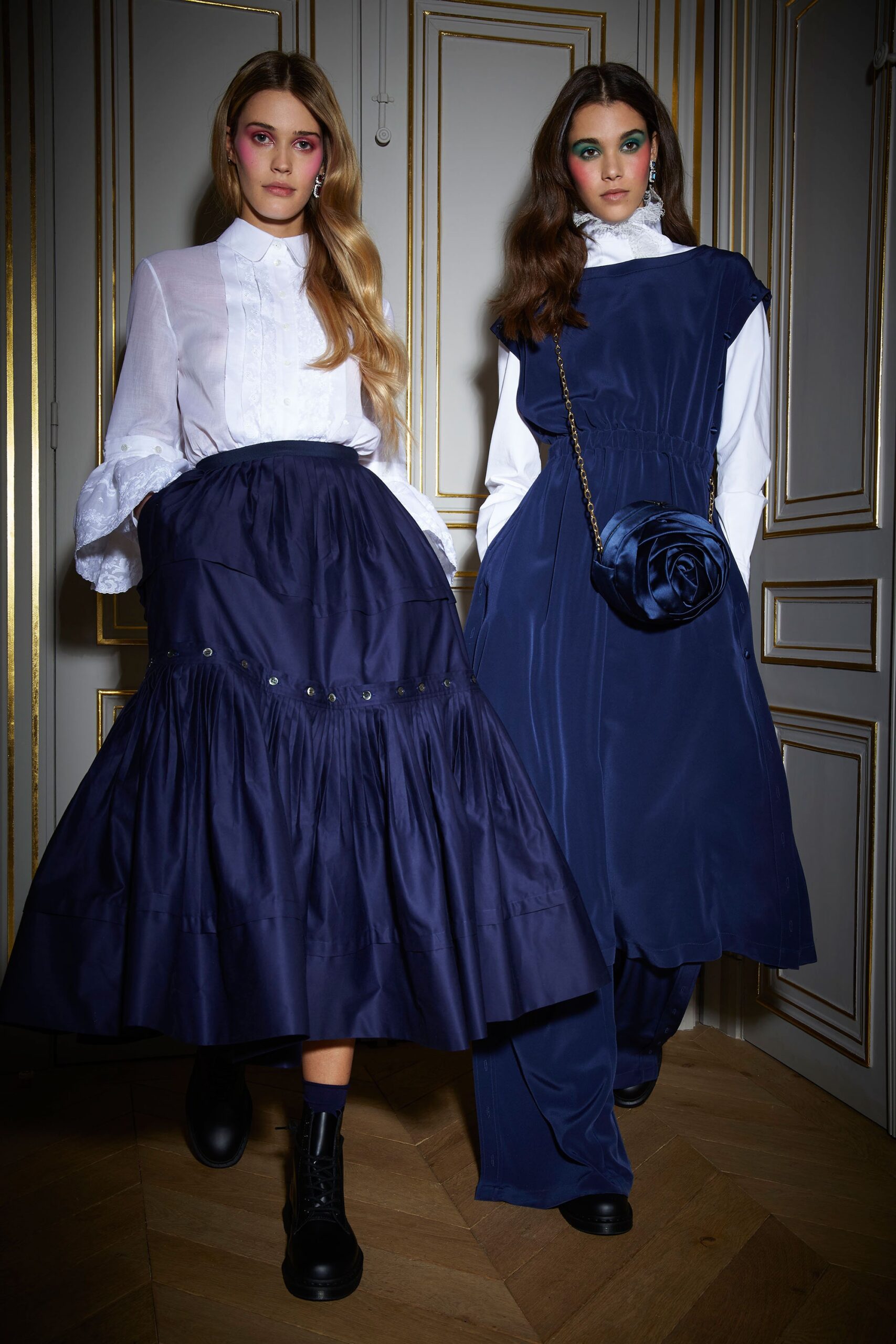 white blouse and navy skirt