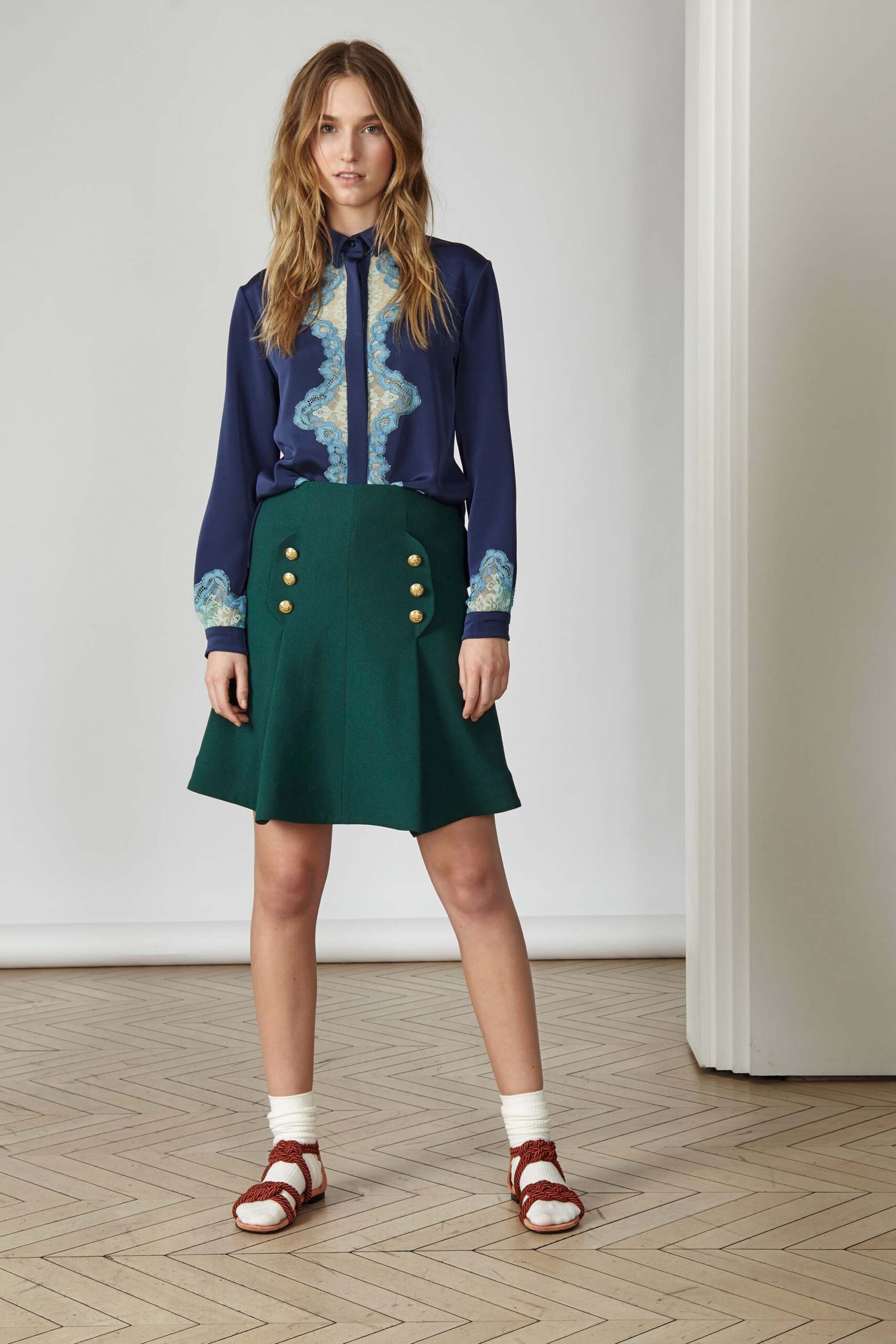 blue printed shirt and green skirt
