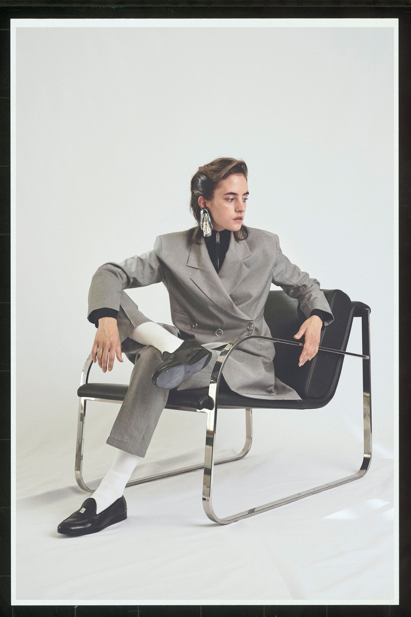 gray tailored suit with black shoes