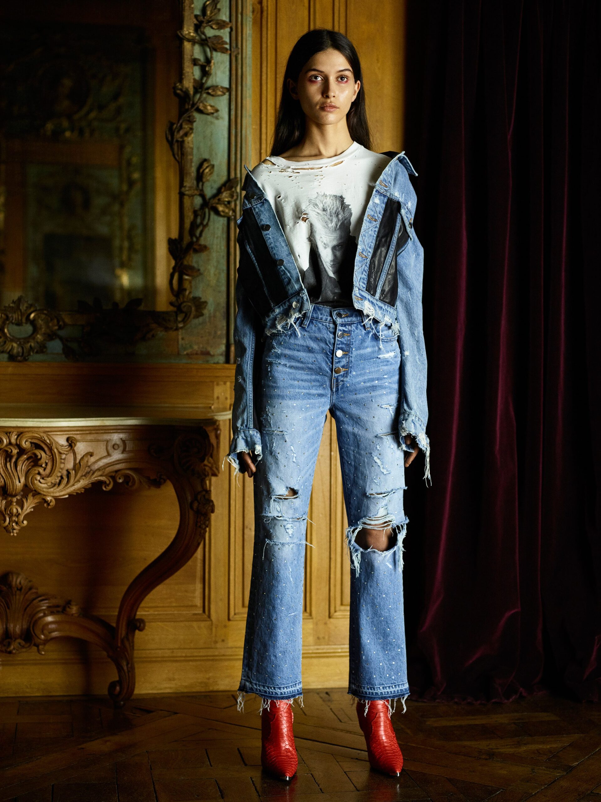 distressed denim jacket with flared jeans