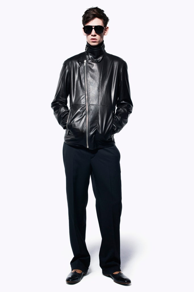 black leather fitted jacket and relaxed pants