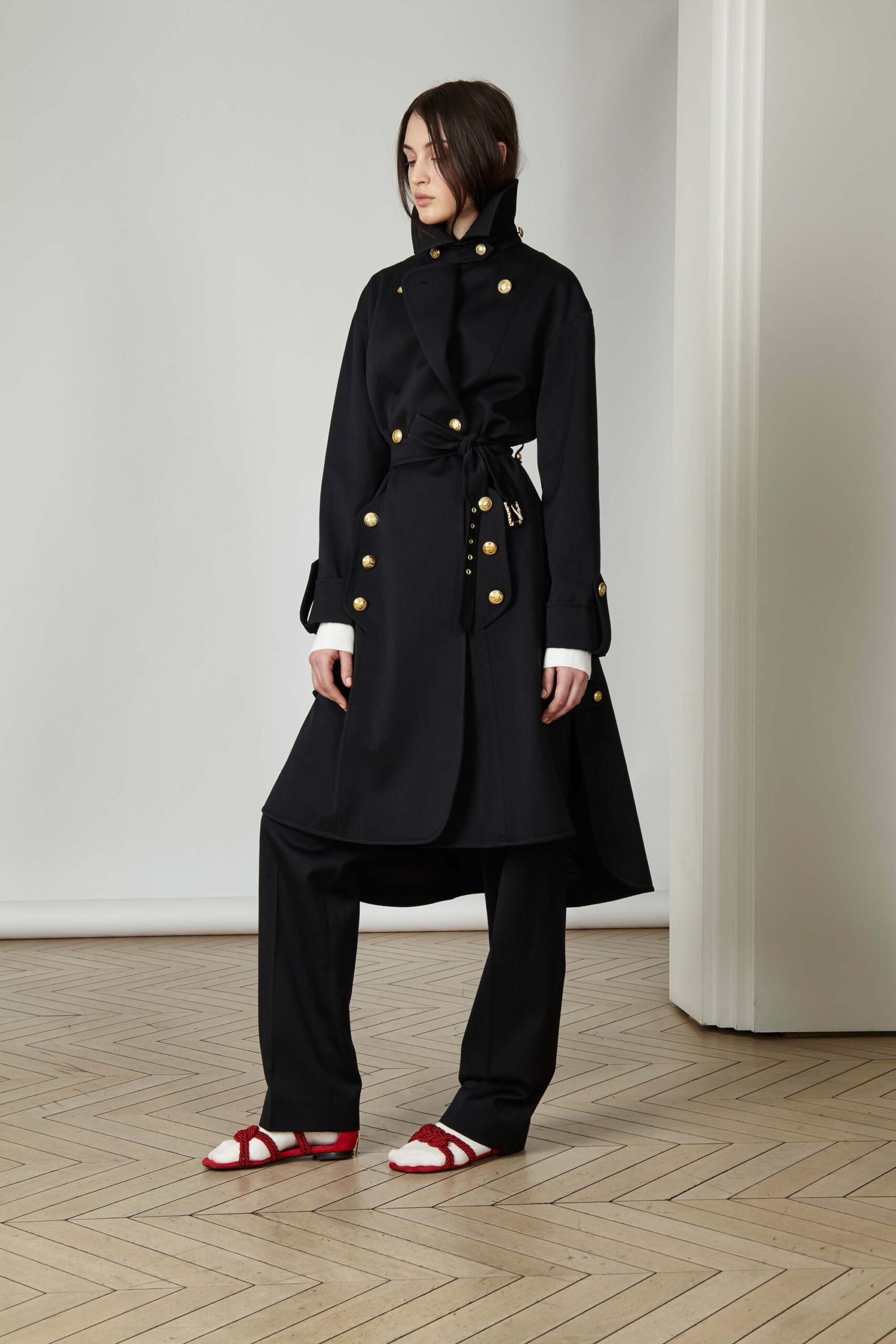 black coat with wide-leg pants