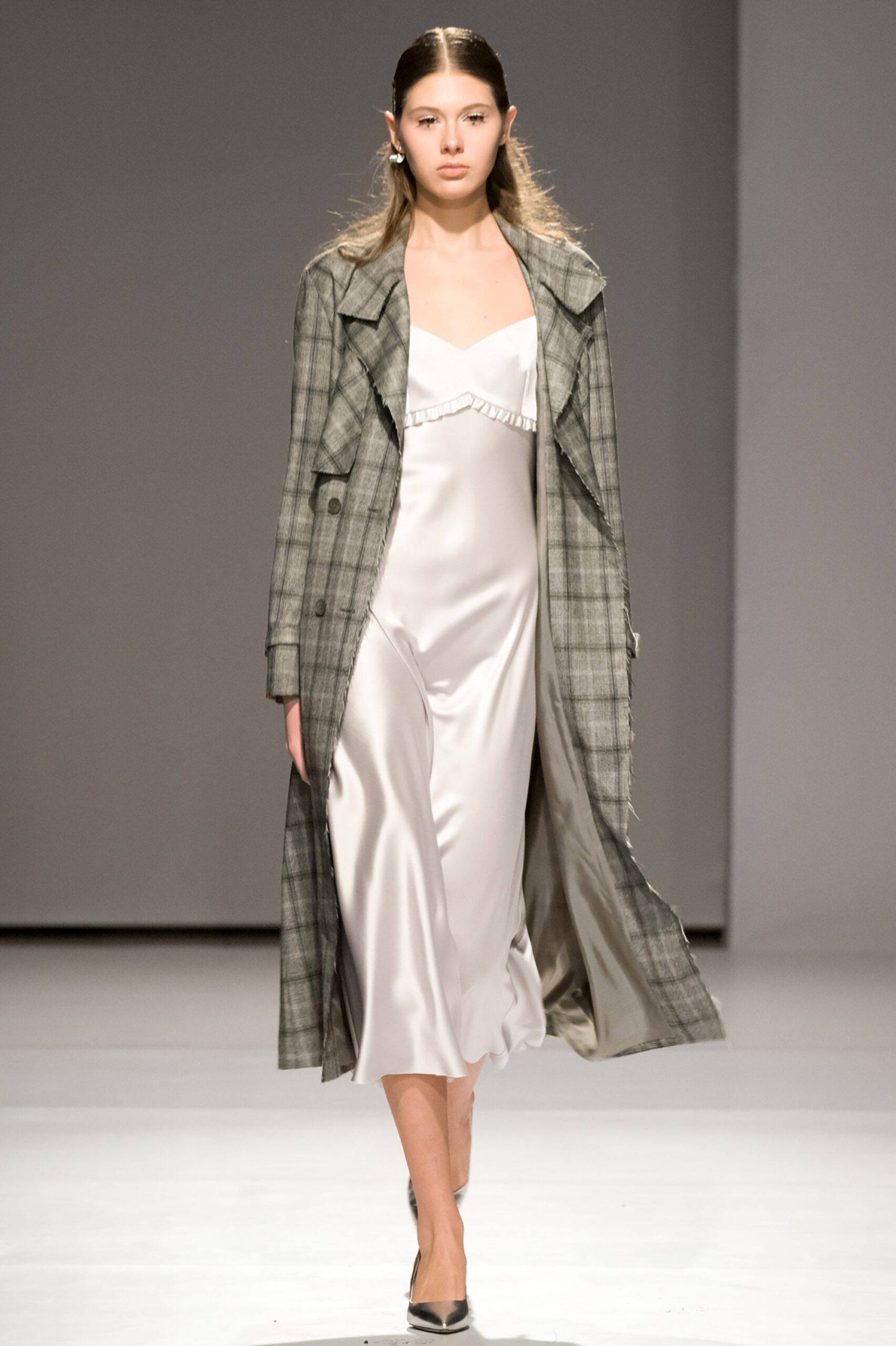 gray wool coat over white silk dress