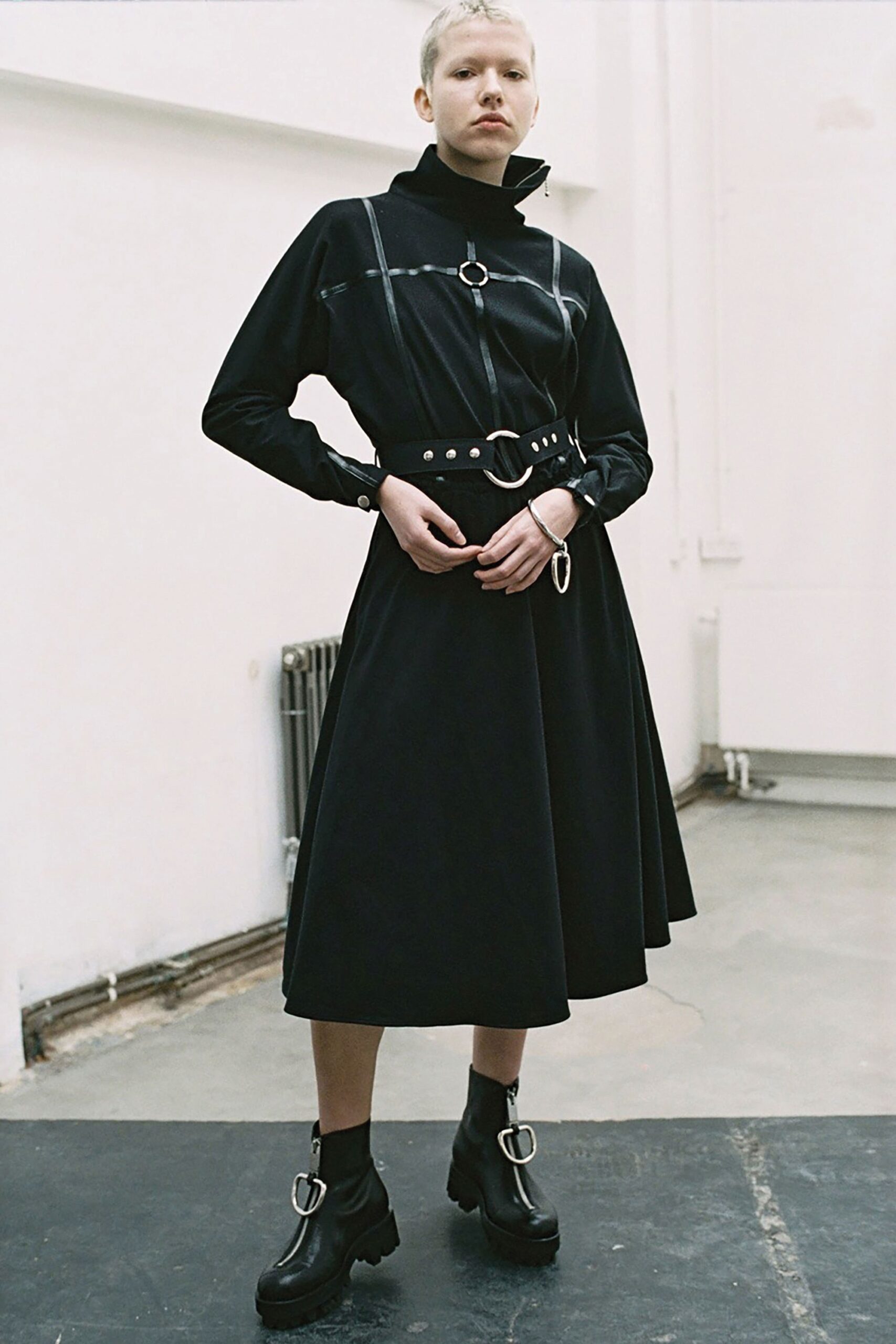 black cotton long-sleeve high-neck fitted belted a-line dress