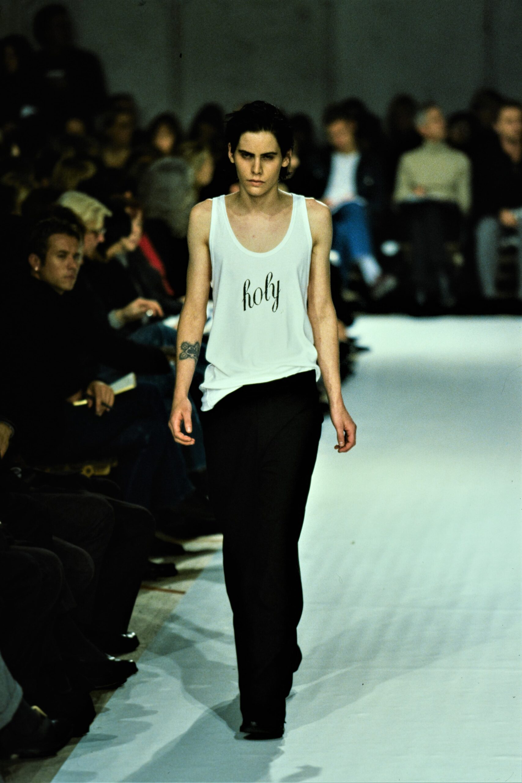 white tank-top and black pants