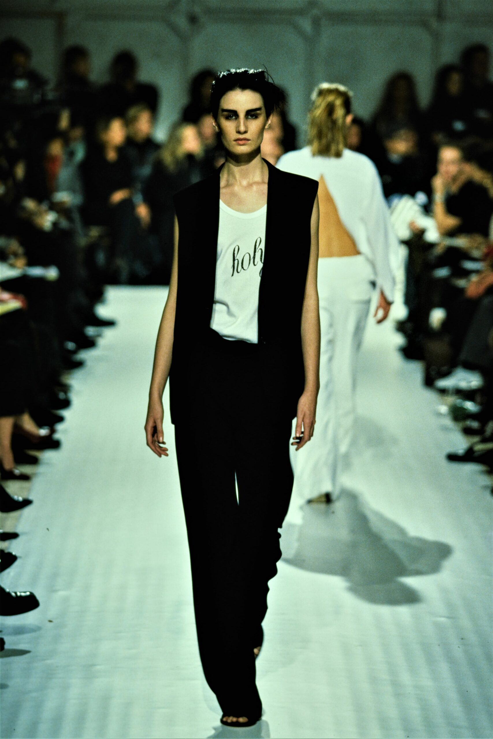 black fitted pants with white top