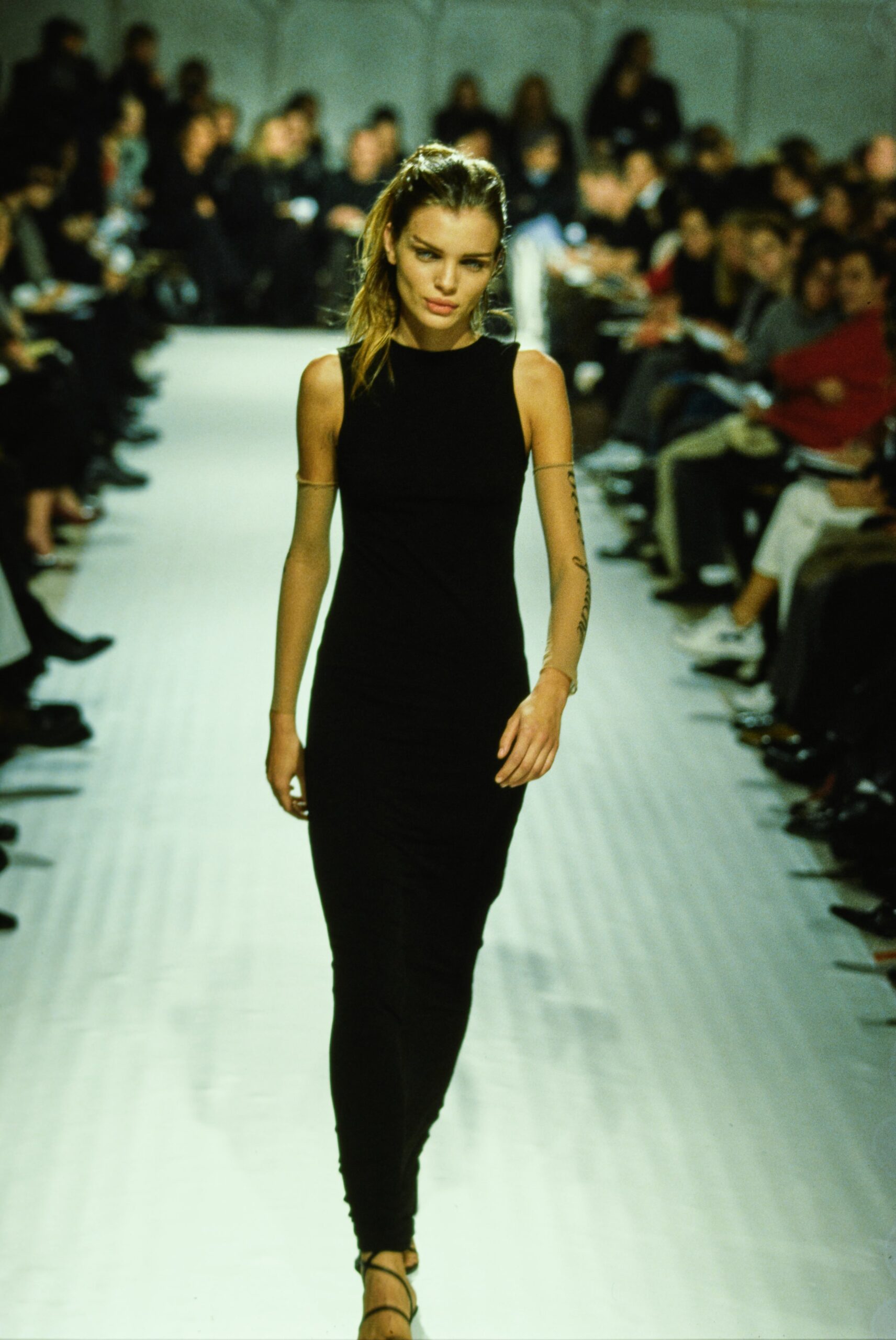 fitted black sleeveless midi dress