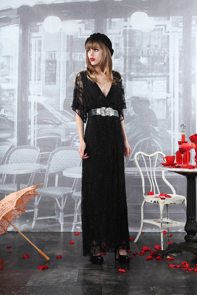 black sequined sleeveless gown