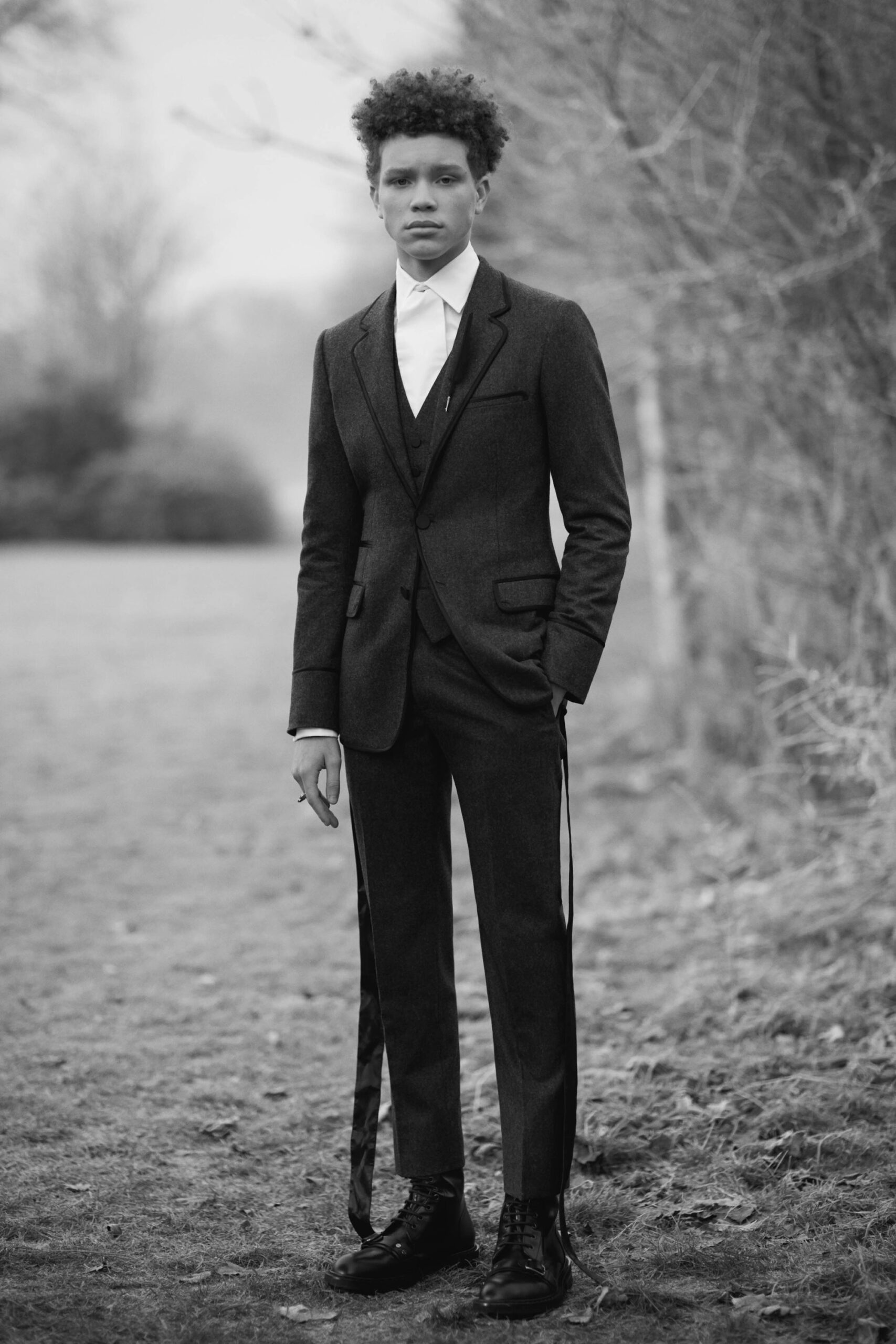 black wool long-sleeve collared tailored buttoned suit