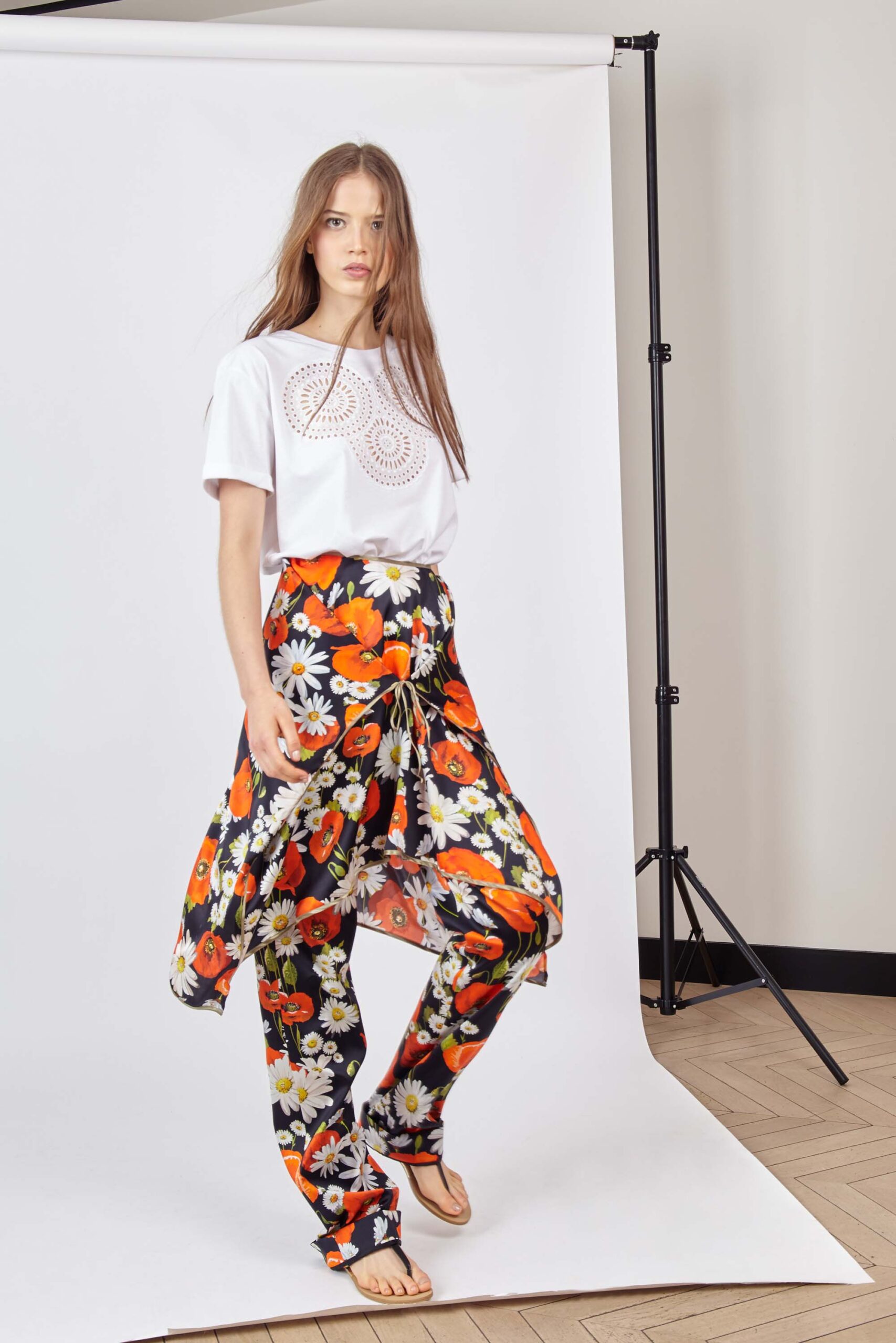 white embroidered top with floral pants