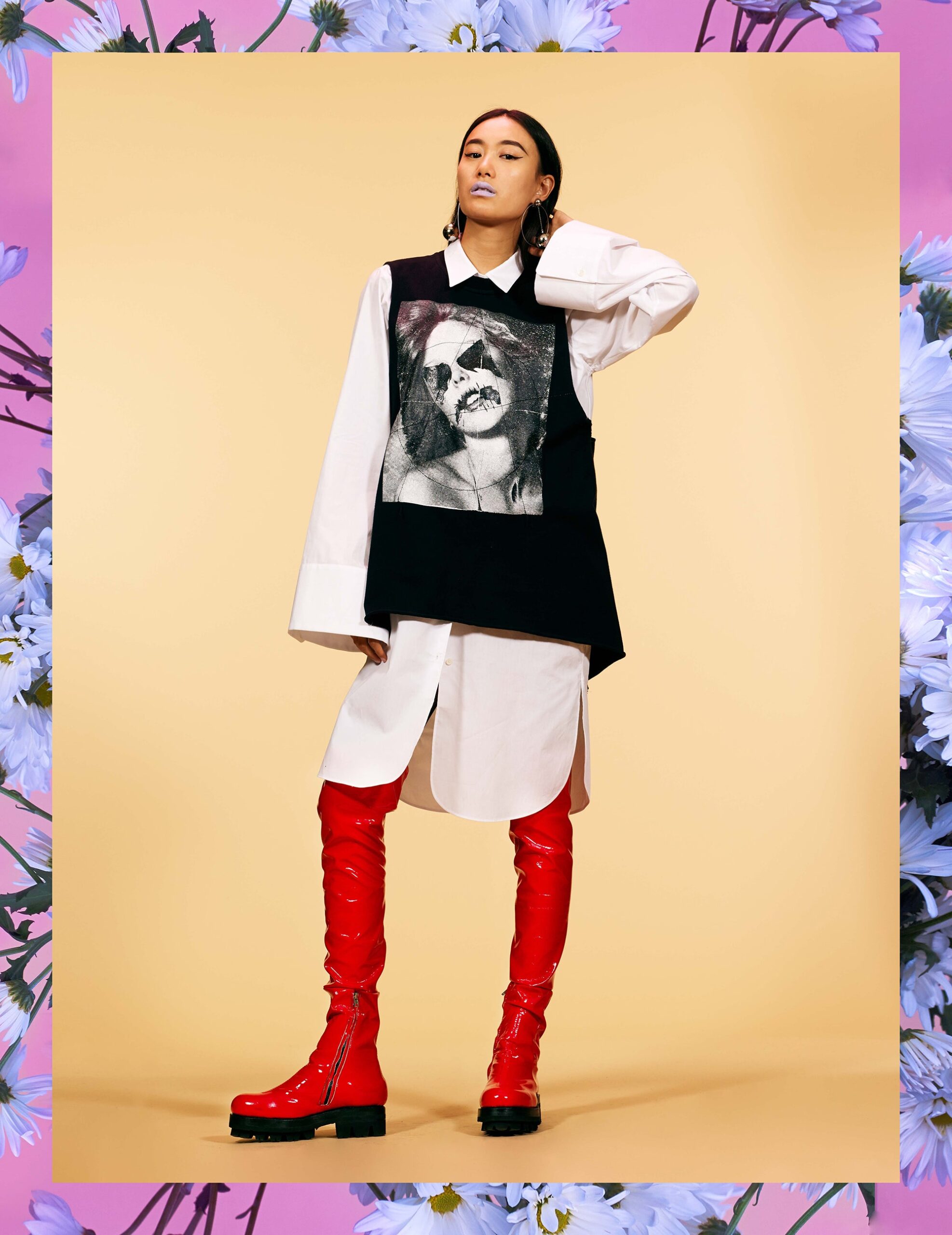 black and white relaxed top with red boots
