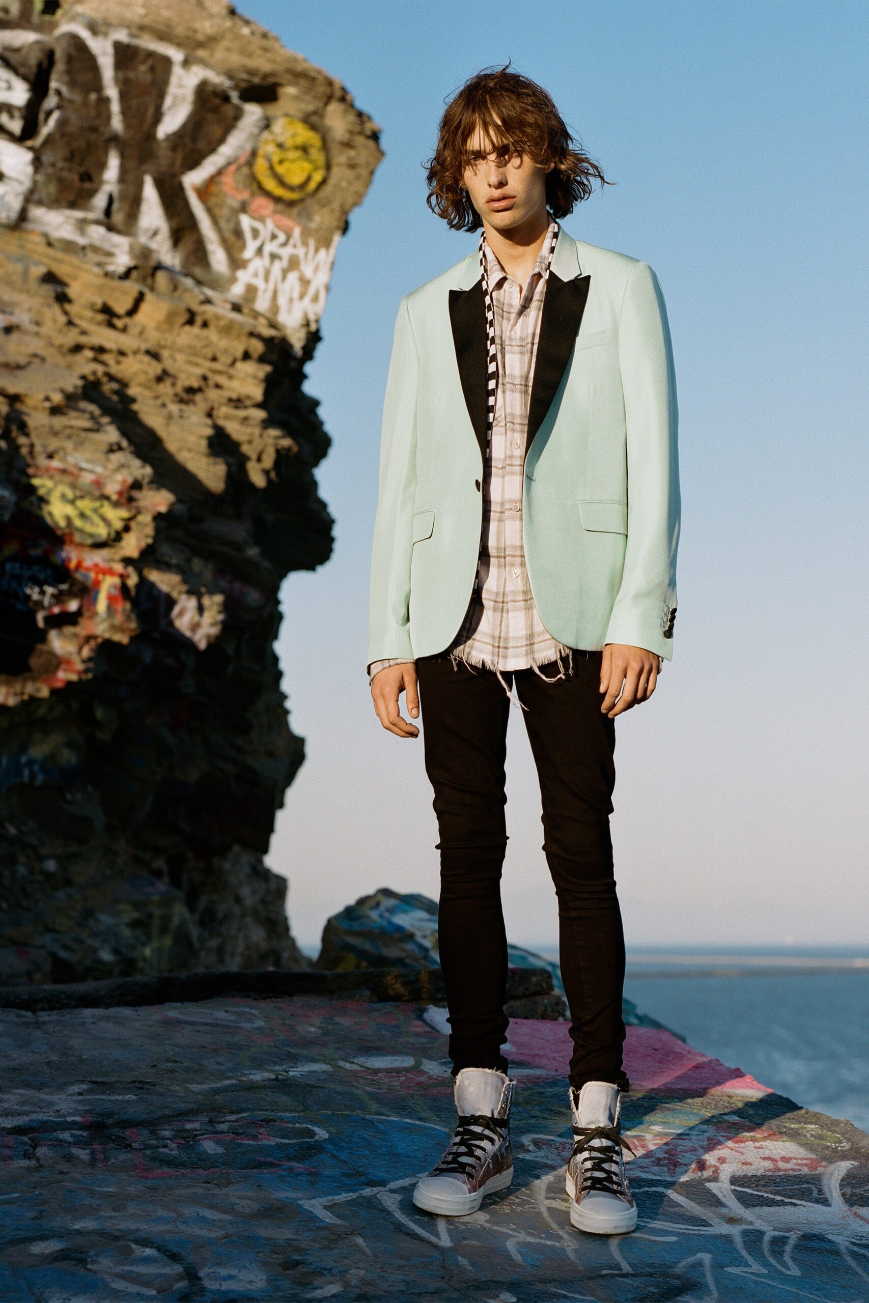 mint blazer with plaid shirt