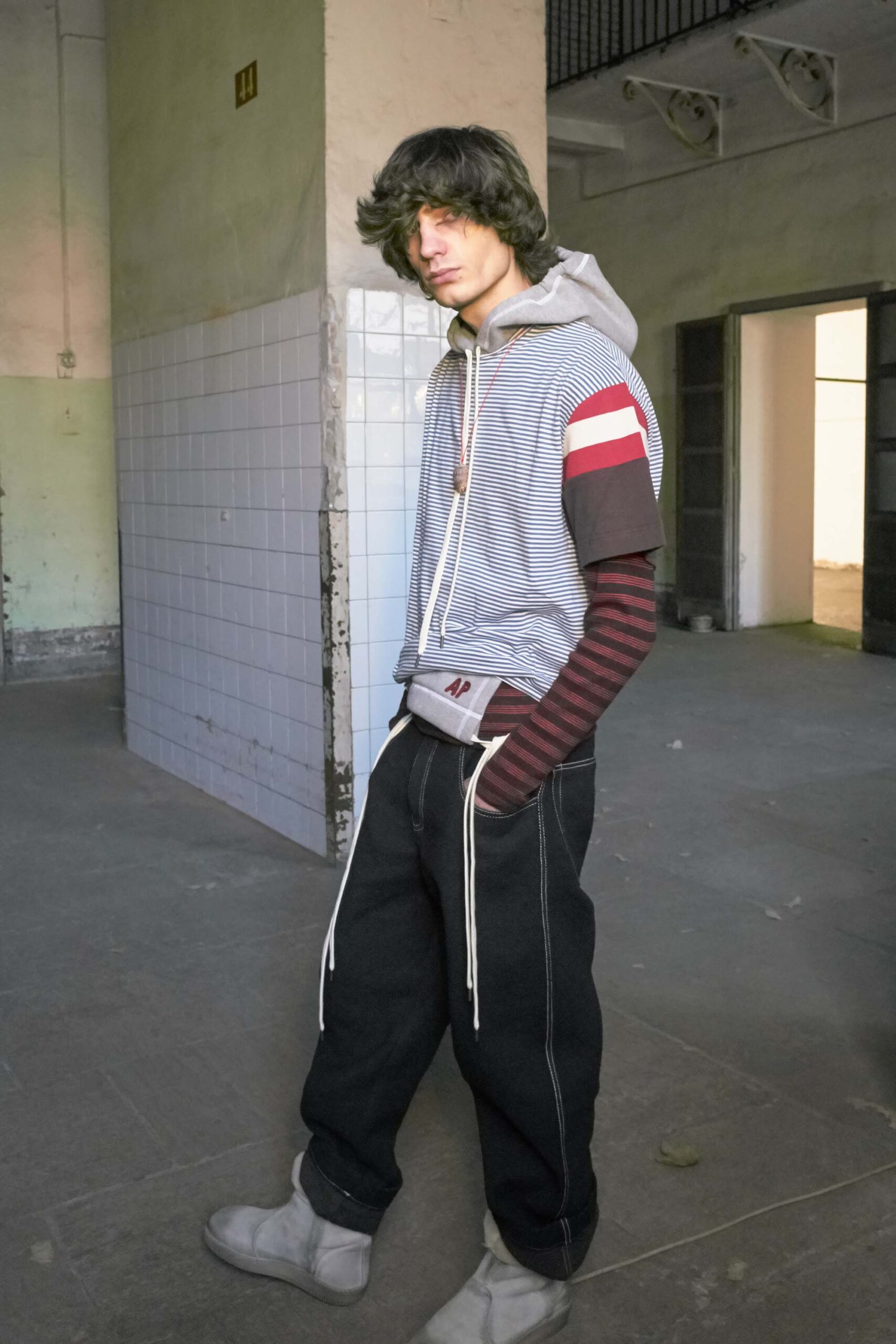 gray striped hoodie with black pants