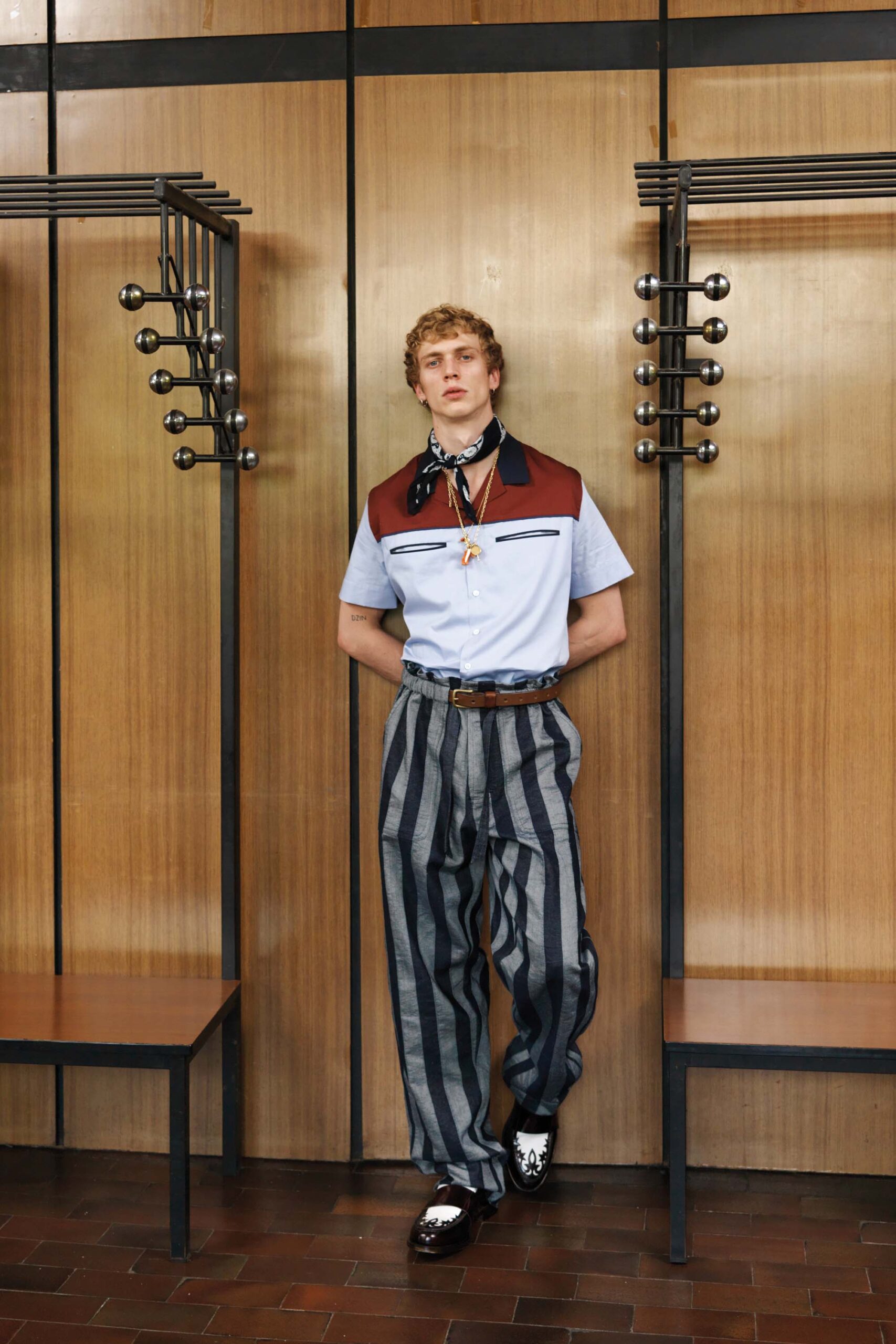 blue and red color-blocked shirt with striped pants
