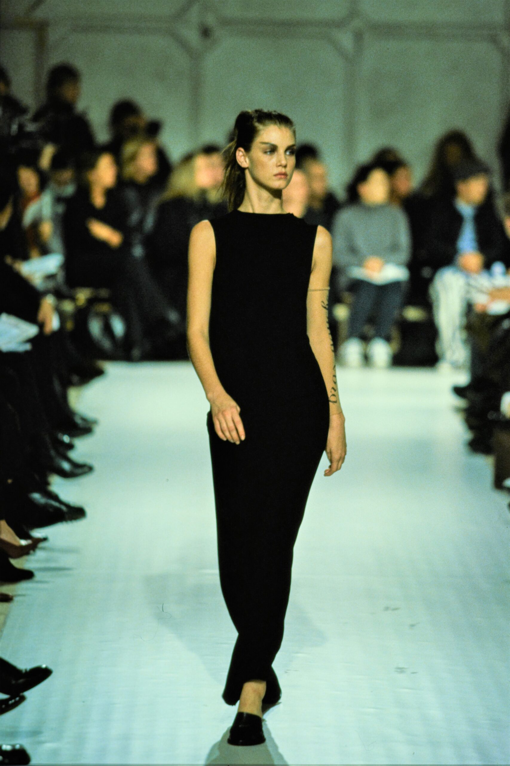 fitted black sleeveless dress
