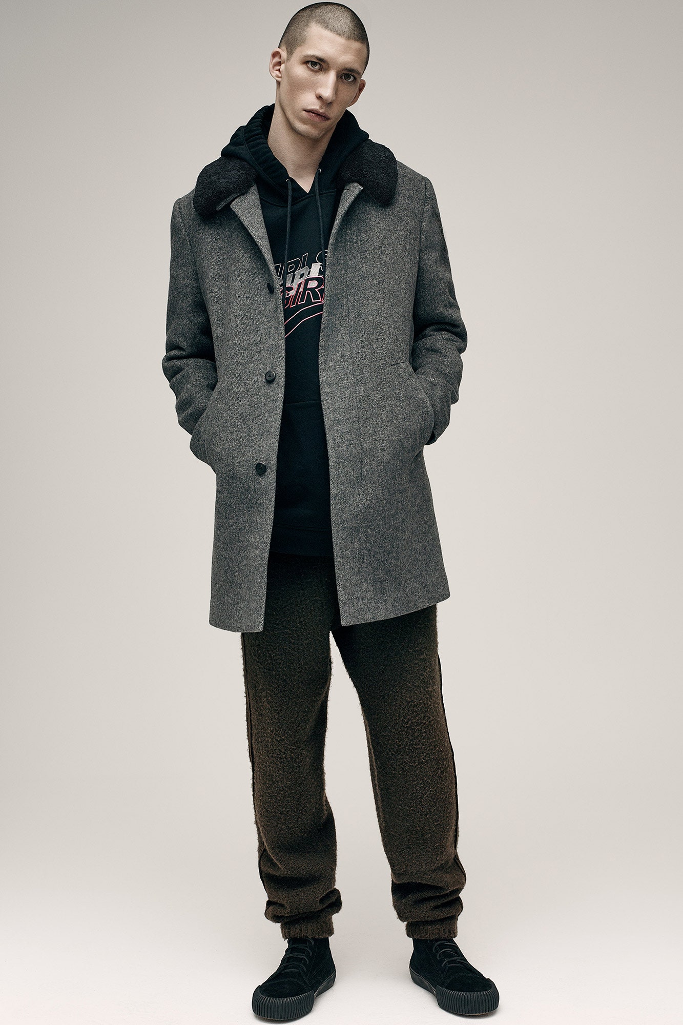 gray wool coat with black hoodie