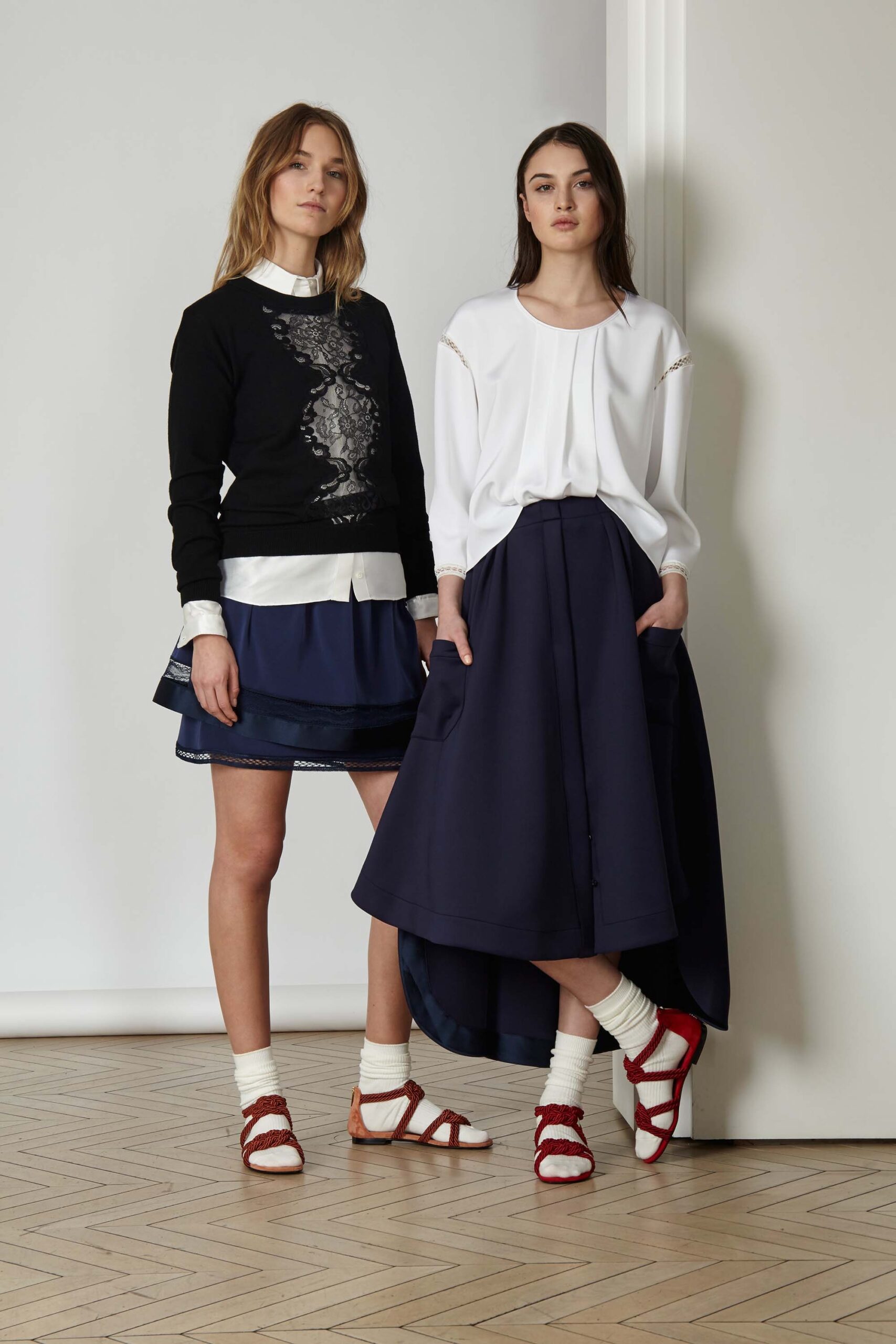 black relaxed sweater with embroidered detail